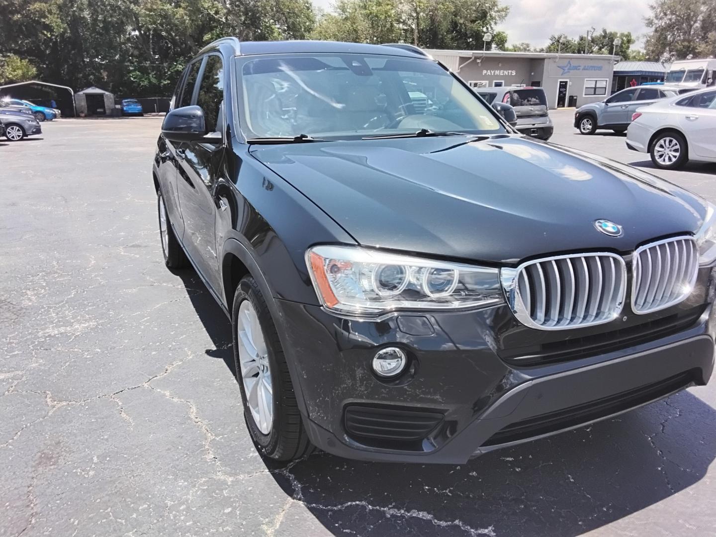 2017 BLACK /Beige BMW X3 sDrive28i (5UXWZ7C54H0) with an 2.0L L4 DOHC 16V engine, 8A transmission, located at 6112 N Florida Avenue, Tampa, FL, 33604, (888) 521-5131, 27.954929, -82.459534 - $499 down plus tax & tag.- Photo#1