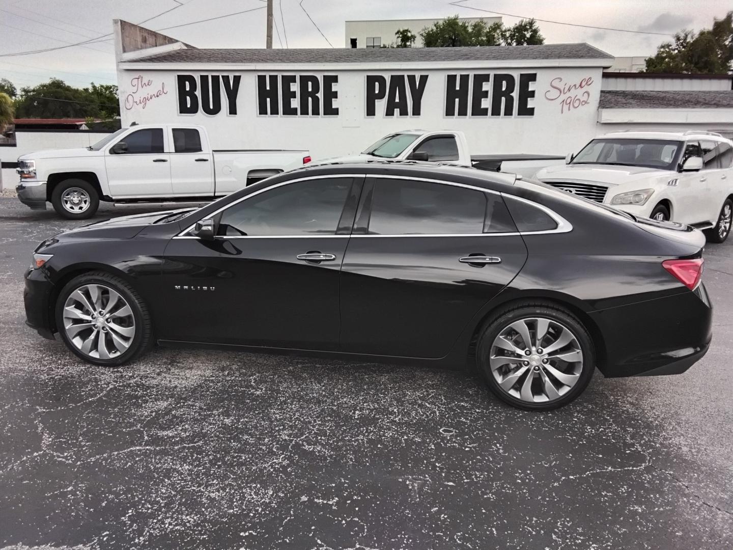 2016 BLACK /BLACK Chevrolet Malibu 2LZ (1G1ZH5SX4GF) with an 2.0L L4 DOHC 16V engine, 6A transmission, located at 6112 N Florida Avenue, Tampa, FL, 33604, (888) 521-5131, 27.954929, -82.459534 - $499 DOWN PLUS TAX & TAG.- Photo#0