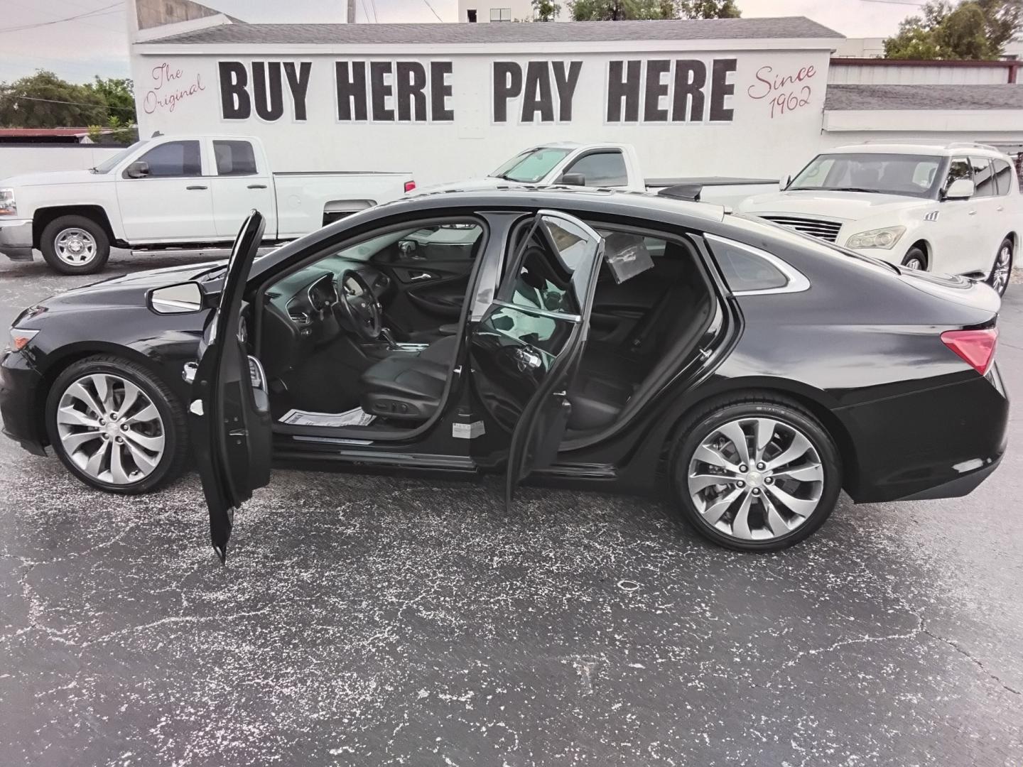 2016 BLACK /BLACK Chevrolet Malibu 2LZ (1G1ZH5SX4GF) with an 2.0L L4 DOHC 16V engine, 6A transmission, located at 6112 N Florida Avenue, Tampa, FL, 33604, (888) 521-5131, 27.954929, -82.459534 - $499 DOWN PLUS TAX & TAG.- Photo#1