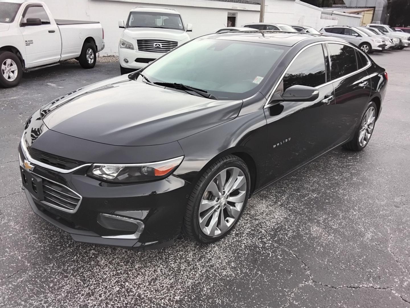 2016 BLACK /BLACK Chevrolet Malibu 2LZ (1G1ZH5SX4GF) with an 2.0L L4 DOHC 16V engine, 6A transmission, located at 6112 N Florida Avenue, Tampa, FL, 33604, (888) 521-5131, 27.954929, -82.459534 - $499 DOWN PLUS TAX & TAG.- Photo#4