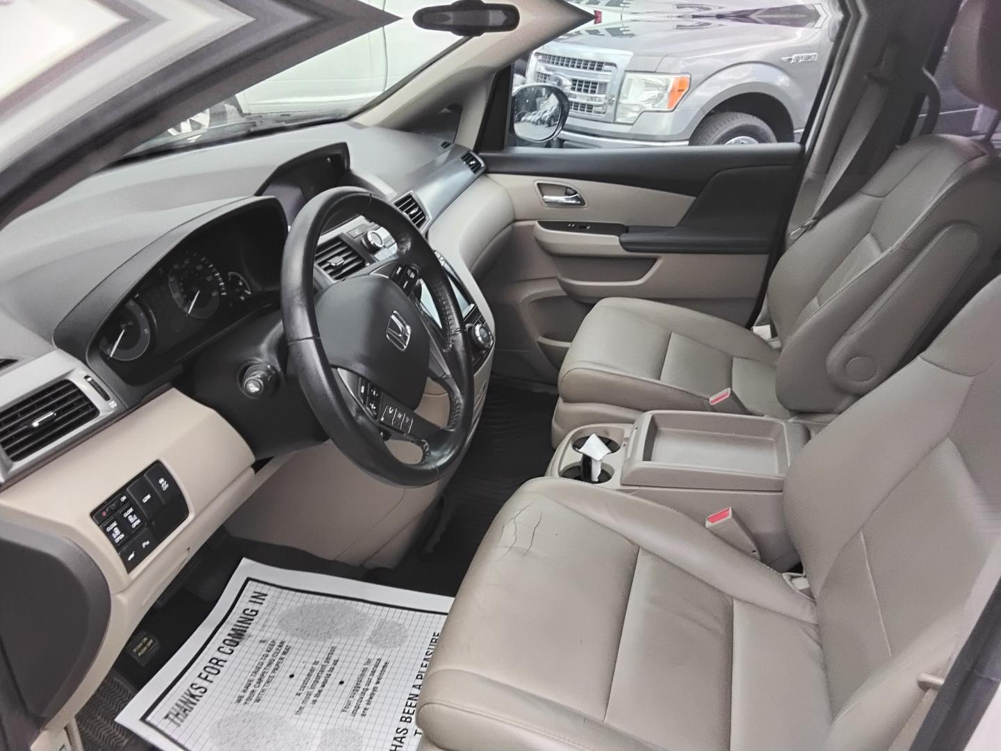 2014 White /Beige Honda Odyssey Touring (5FNRL5H90EB) with an 3.5L V6 SOHC 24V engine, 6-Speed Automatic transmission, located at 6112 N Florida Avenue, Tampa, FL, 33604, (888) 521-5131, 27.954929, -82.459534 - $499 DOWN PLUS TAX & TAG.- Photo#6