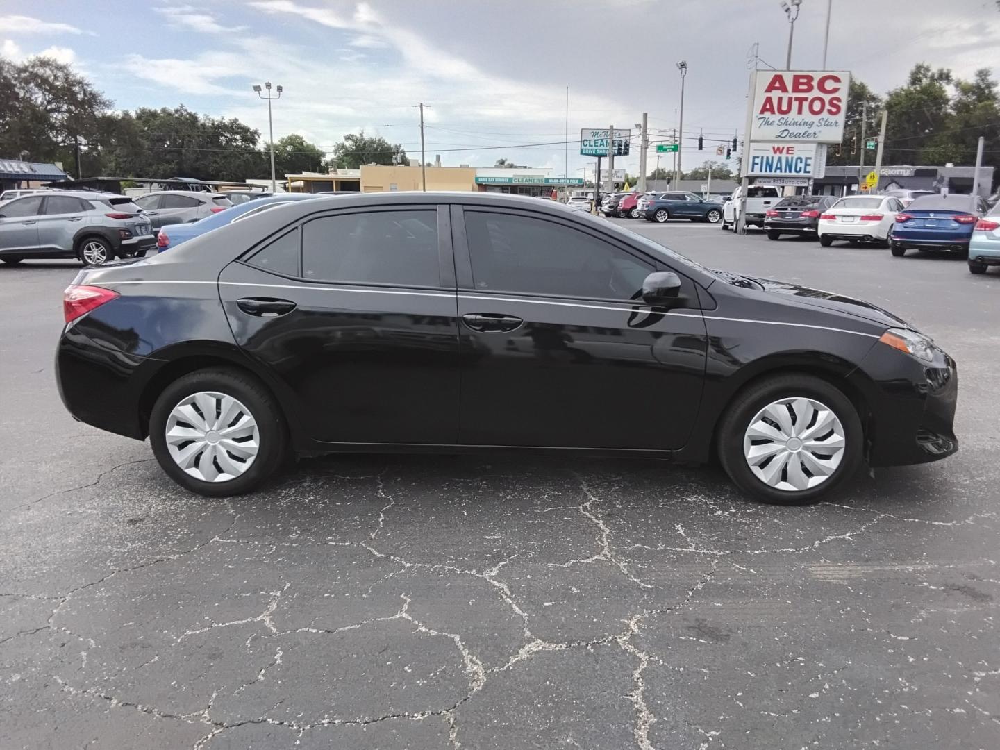 2019 BLACK /Beige Toyota Corolla L CVT (5YFBURHE5KP) with an 1.8L L4 DOHC 16V engine, CVT transmission, located at 6112 N Florida Avenue, Tampa, FL, 33604, (888) 521-5131, 27.954929, -82.459534 - $499 DOWN PLUS TAX & TAG.- Photo#4