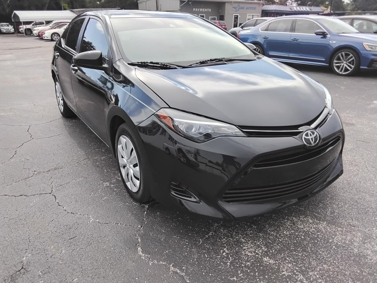 2019 BLACK /Beige Toyota Corolla L CVT (5YFBURHE5KP) with an 1.8L L4 DOHC 16V engine, CVT transmission, located at 6112 N Florida Avenue, Tampa, FL, 33604, (888) 521-5131, 27.954929, -82.459534 - $499 DOWN PLUS TAX & TAG.- Photo#2