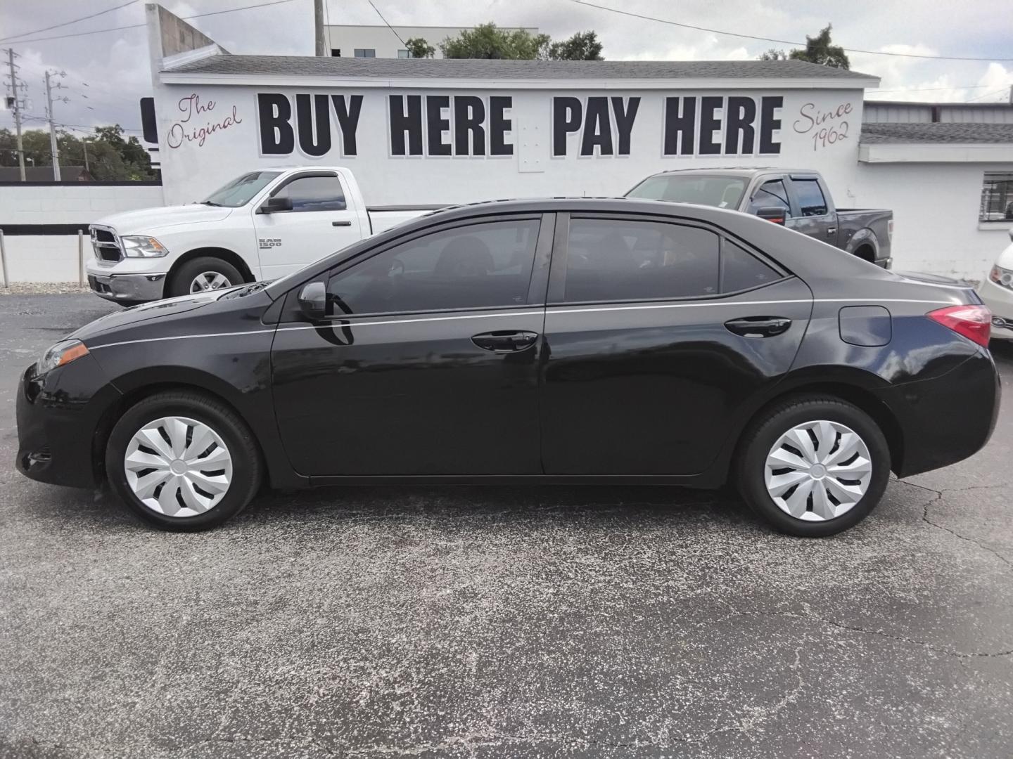2019 BLACK /Beige Toyota Corolla L CVT (5YFBURHE5KP) with an 1.8L L4 DOHC 16V engine, CVT transmission, located at 6112 N Florida Avenue, Tampa, FL, 33604, (888) 521-5131, 27.954929, -82.459534 - $499 DOWN PLUS TAX & TAG.- Photo#0