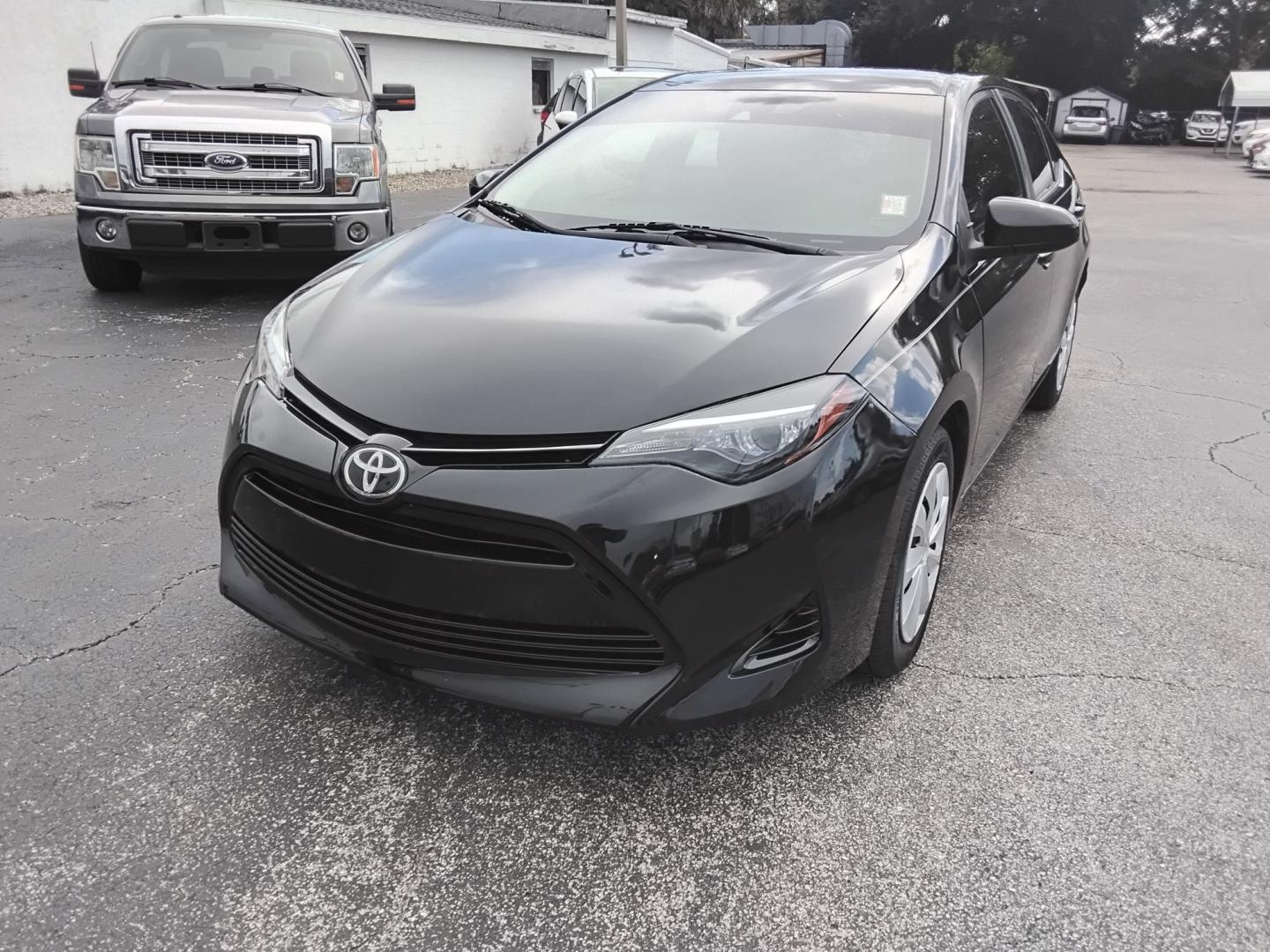 2019 BLACK /Beige Toyota Corolla L CVT (5YFBURHE5KP) with an 1.8L L4 DOHC 16V engine, CVT transmission, located at 6112 N Florida Avenue, Tampa, FL, 33604, (888) 521-5131, 27.954929, -82.459534 - $499 DOWN PLUS TAX & TAG.- Photo#3