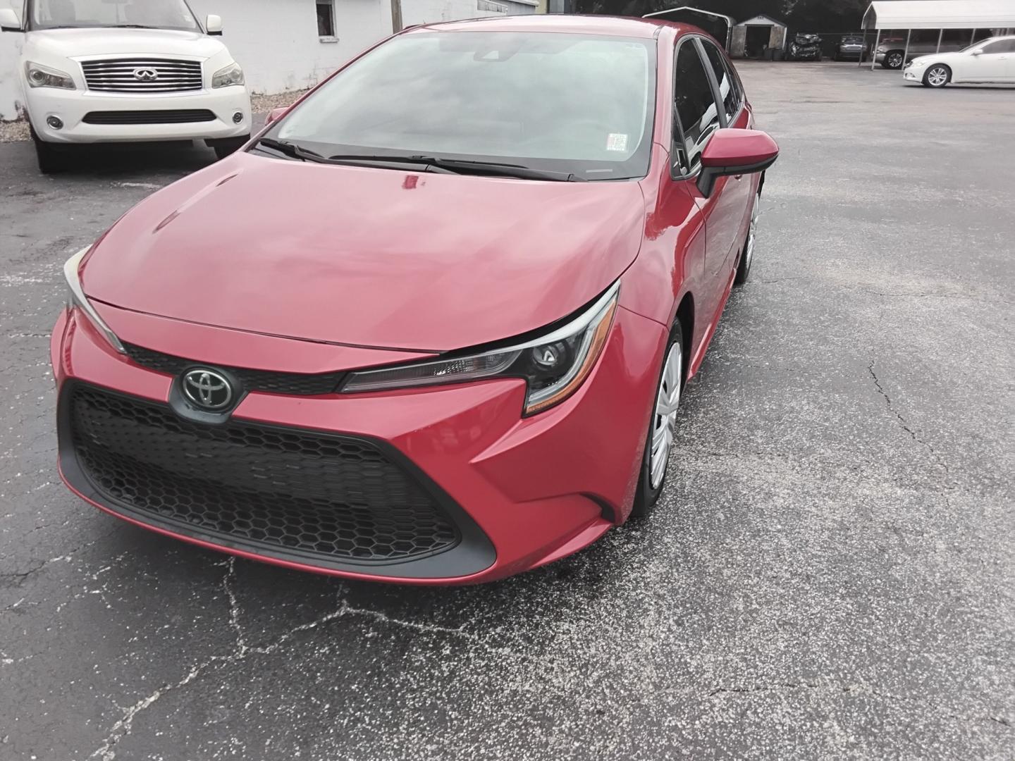 2021 RED /Grey Toyota Corolla LE (5YFEPMAE7MP) with an 1.8L L4 DOHC 16V engine, CVT transmission, located at 6112 N Florida Avenue, Tampa, FL, 33604, (888) 521-5131, 27.954929, -82.459534 - $499 DOWN PLUS TAX & TAG.- Photo#1