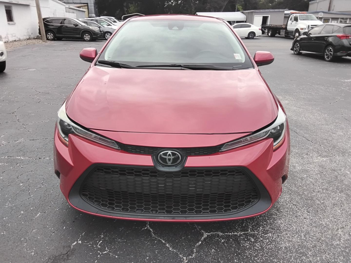 2021 RED /Grey Toyota Corolla LE (5YFEPMAE7MP) with an 1.8L L4 DOHC 16V engine, CVT transmission, located at 6112 N Florida Avenue, Tampa, FL, 33604, (888) 521-5131, 27.954929, -82.459534 - $499 DOWN PLUS TAX & TAG.- Photo#2