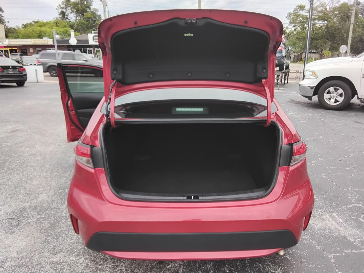 2021 RED /Grey Toyota Corolla LE (5YFEPMAE7MP) with an 1.8L L4 DOHC 16V engine, CVT transmission, located at 6112 N Florida Avenue, Tampa, FL, 33604, (888) 521-5131, 27.954929, -82.459534 - $499 DOWN PLUS TAX & TAG.- Photo#6