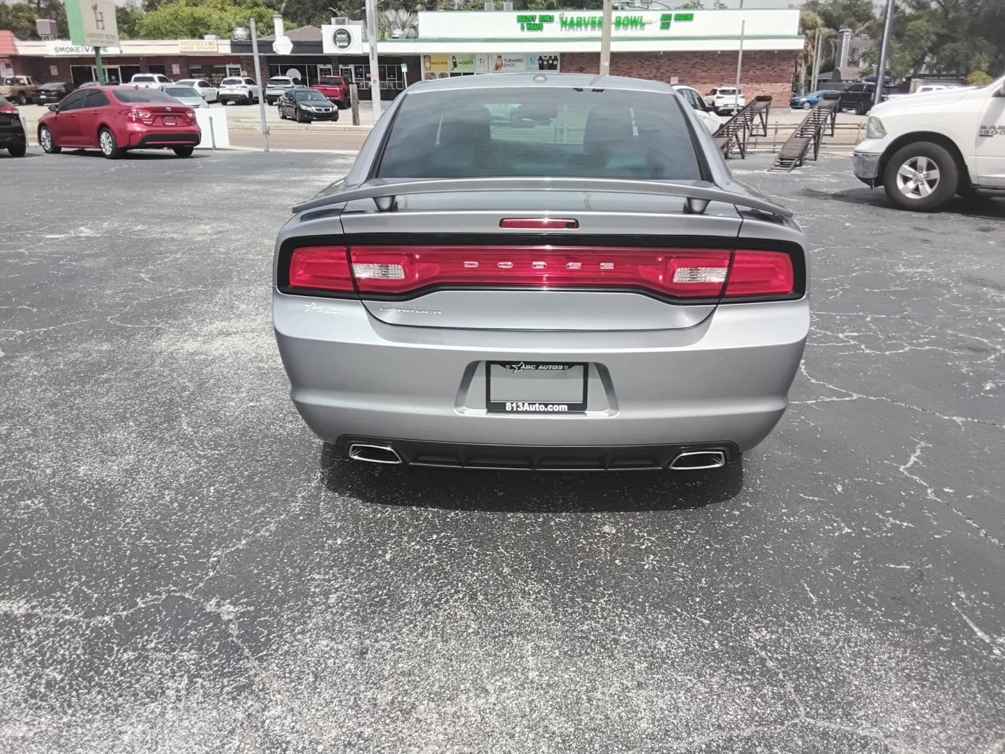 2014 SILVER /Black Dodge Charger SXT (2C3CDXHG0EH) with an 3.6L V6 DOHC 24V engine, 8-Speed Automatic transmission, located at 6112 N Florida Avenue, Tampa, FL, 33604, (888) 521-5131, 27.954929, -82.459534 - $499 DOWN PLUS TAX & TAX.- Photo#7