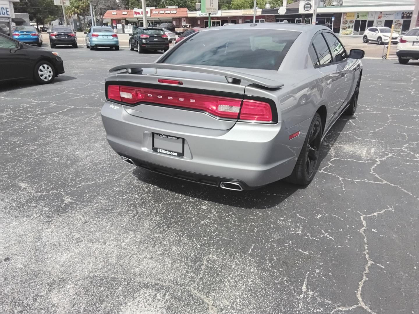 2014 SILVER /Black Dodge Charger SXT (2C3CDXHG0EH) with an 3.6L V6 DOHC 24V engine, 8-Speed Automatic transmission, located at 6112 N Florida Avenue, Tampa, FL, 33604, (888) 521-5131, 27.954929, -82.459534 - $499 DOWN PLUS TAX & TAX.- Photo#5