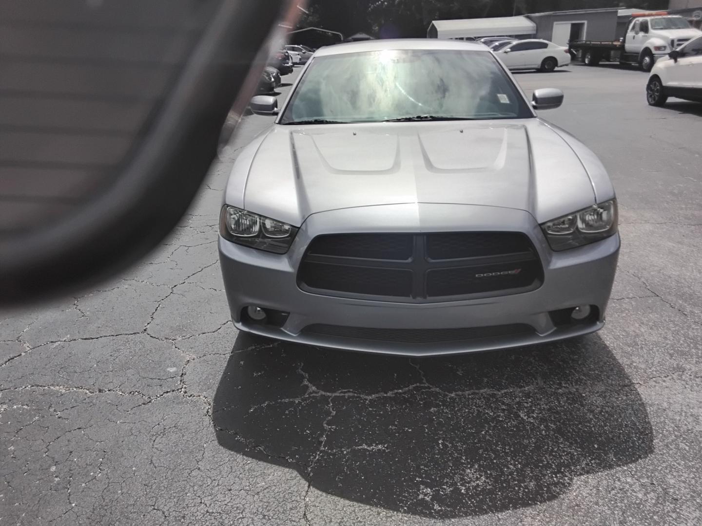 2014 SILVER /Black Dodge Charger SXT (2C3CDXHG0EH) with an 3.6L V6 DOHC 24V engine, 8-Speed Automatic transmission, located at 6112 N Florida Avenue, Tampa, FL, 33604, (888) 521-5131, 27.954929, -82.459534 - $499 DOWN PLUS TAX & TAX.- Photo#2