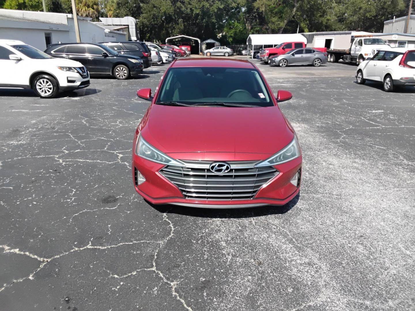 2020 RED /Beige Hyundai Elantra Limited (5NPD84LF2LH) with an 2.0L L4 DOHC 16V engine, 6A transmission, located at 6112 N Florida Avenue, Tampa, FL, 33604, (888) 521-5131, 27.954929, -82.459534 - $499 DOWN PLUS TAX & TAG.- Photo#1