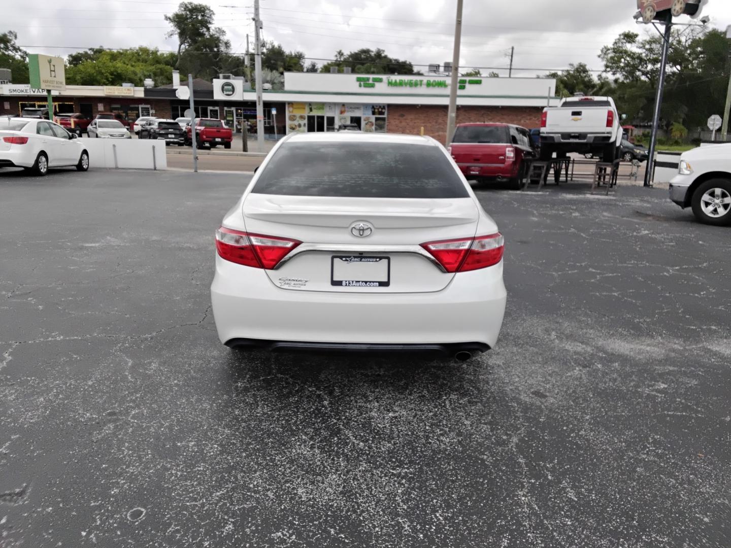 2016 White /BLACK Toyota Camry SE (4T1BF1FK3GU) with an 2.5L L4 DOHC 16V engine, 6-Speed Automatic transmission, located at 6112 N Florida Avenue, Tampa, FL, 33604, (888) 521-5131, 27.954929, -82.459534 - $499 DOWN PLUS TAX & TAG.- Photo#7