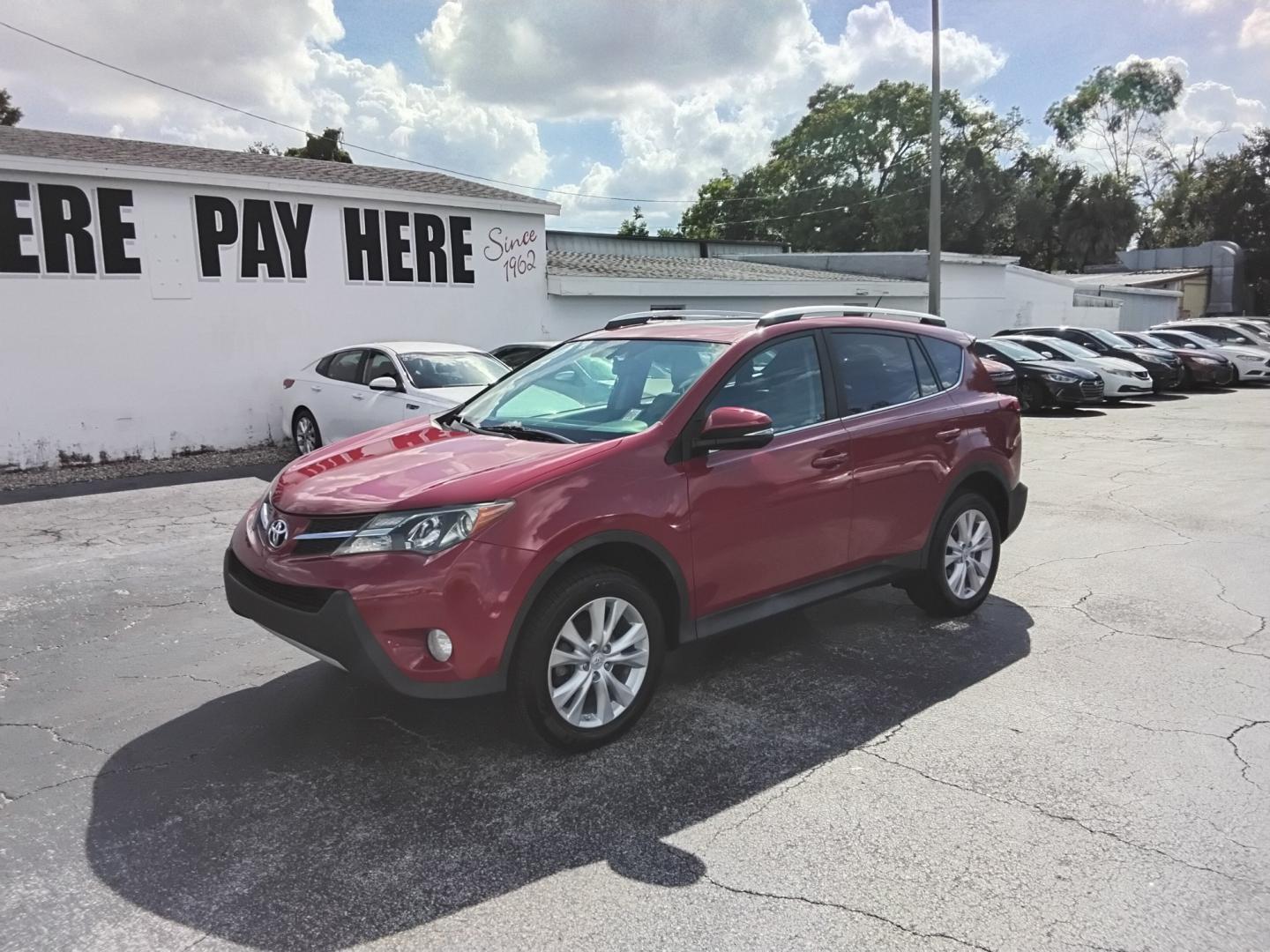 2015 RED /BLACK Toyota RAV4 Limited FWD (2T3YFREV1FW) with an 2.5L L4 DOHC 16V engine, 6-Speed Automatic transmission, located at 6112 N Florida Avenue, Tampa, FL, 33604, (888) 521-5131, 27.954929, -82.459534 - $499 down plus tax & tag.- Photo#2