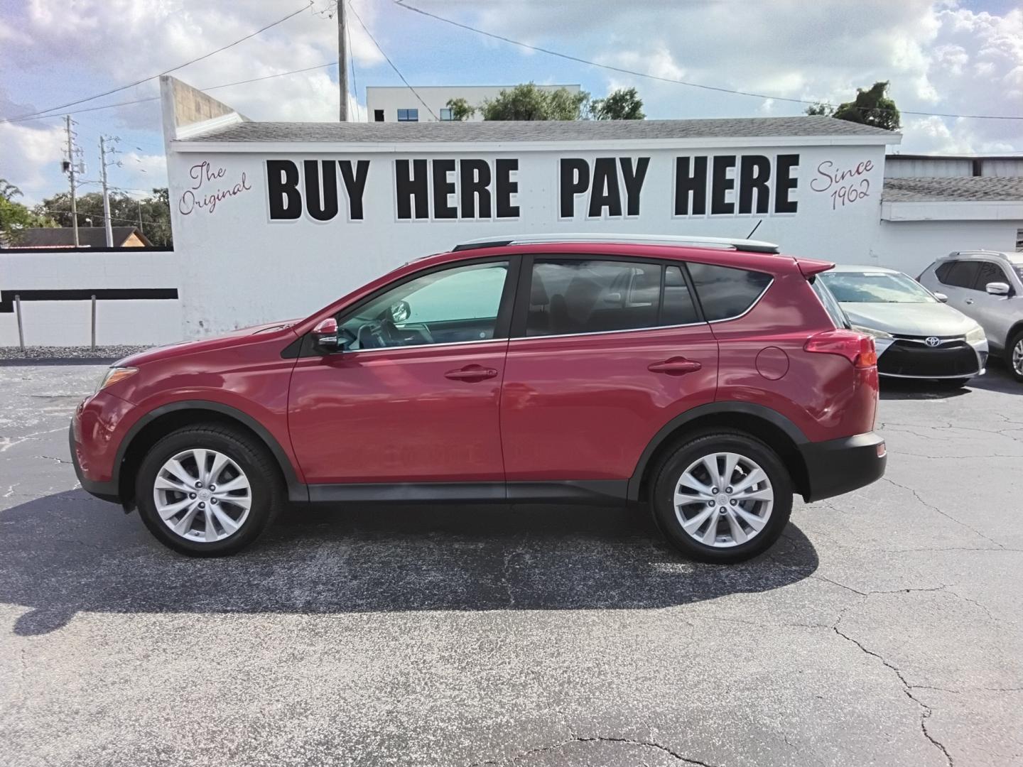 2015 RED /BLACK Toyota RAV4 Limited FWD (2T3YFREV1FW) with an 2.5L L4 DOHC 16V engine, 6-Speed Automatic transmission, located at 6112 N Florida Avenue, Tampa, FL, 33604, (888) 521-5131, 27.954929, -82.459534 - $499 down plus tax & tag.- Photo#0