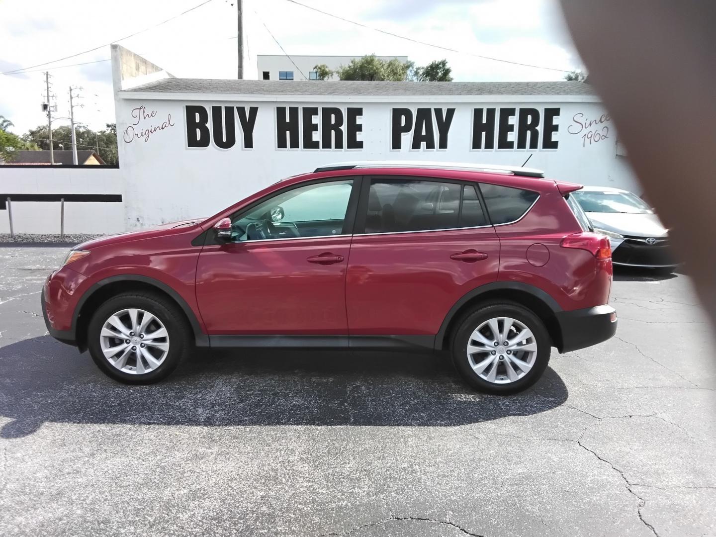 2015 RED /BLACK Toyota RAV4 Limited FWD (2T3YFREV1FW) with an 2.5L L4 DOHC 16V engine, 6-Speed Automatic transmission, located at 6112 N Florida Avenue, Tampa, FL, 33604, (888) 521-5131, 27.954929, -82.459534 - $499 down plus tax & tag.- Photo#1