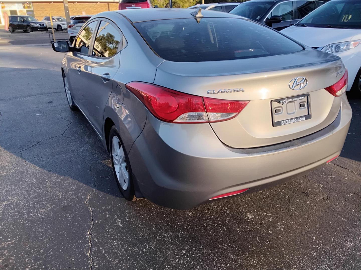 2012 Grey /Beige Hyundai Elantra GLS A/T (KMHDH4AE2CU) with an 1.8L L4 DOHC 16V engine, 6-Speed Automatic transmission, located at 6112 N Florida Avenue, Tampa, FL, 33604, (888) 521-5131, 27.954929, -82.459534 - 499$ down plus tax & tag. - Photo#5