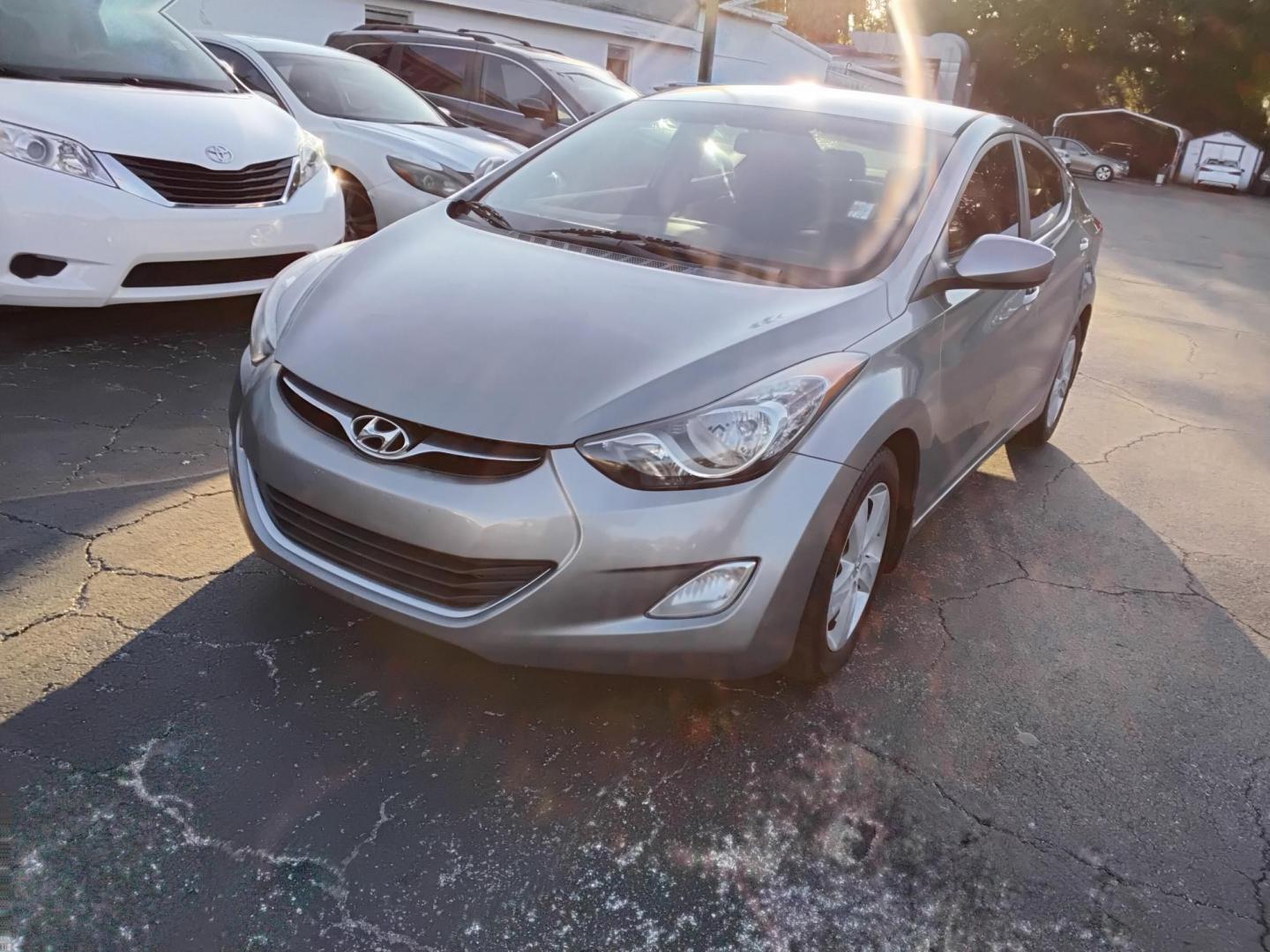 2012 Grey /Beige Hyundai Elantra GLS A/T (KMHDH4AE2CU) with an 1.8L L4 DOHC 16V engine, 6-Speed Automatic transmission, located at 6112 N Florida Avenue, Tampa, FL, 33604, (888) 521-5131, 27.954929, -82.459534 - 499$ down plus tax & tag. - Photo#1
