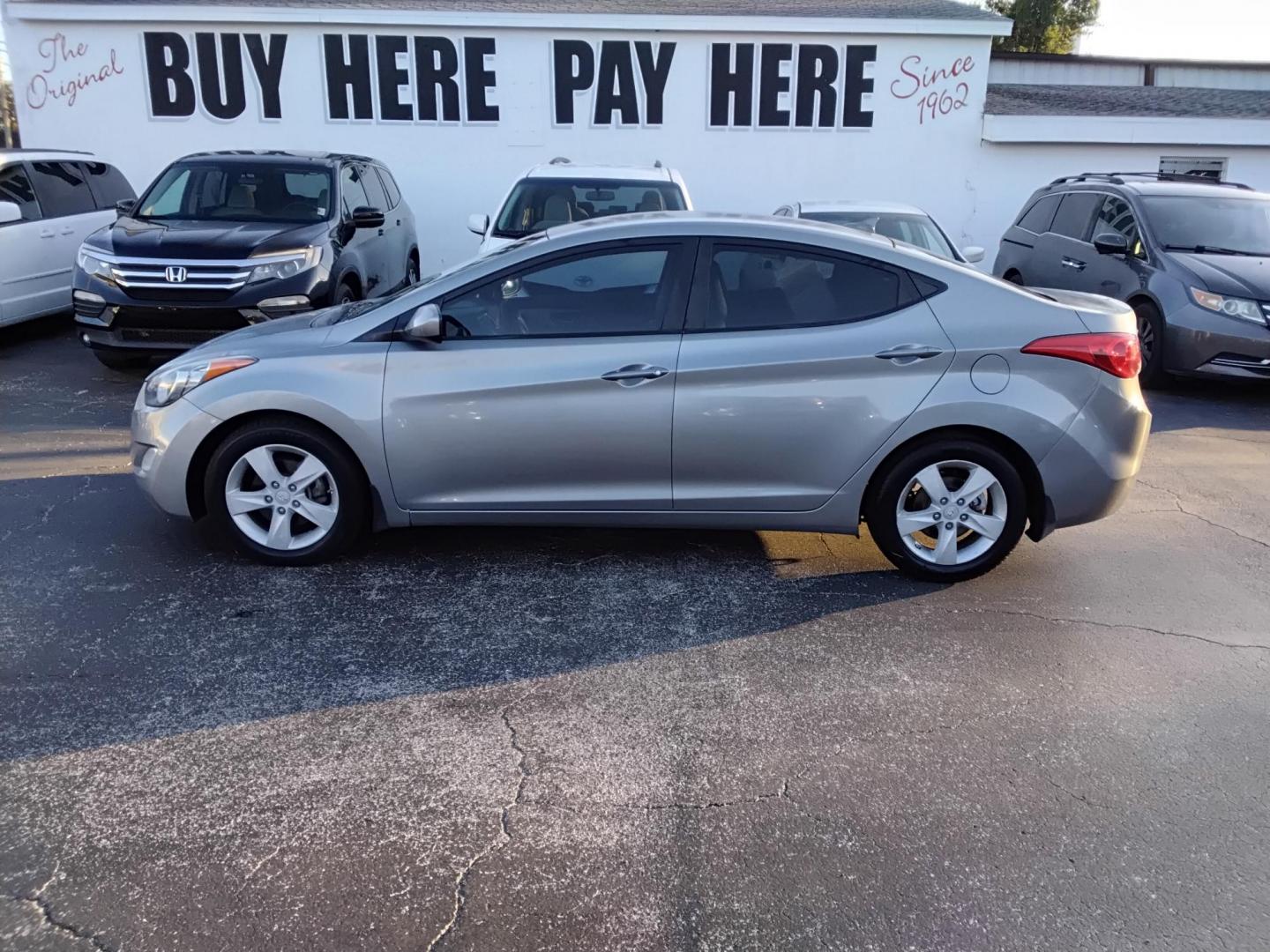 2012 Grey /Beige Hyundai Elantra GLS A/T (KMHDH4AE2CU) with an 1.8L L4 DOHC 16V engine, 6-Speed Automatic transmission, located at 6112 N Florida Avenue, Tampa, FL, 33604, (888) 521-5131, 27.954929, -82.459534 - 499$ down plus tax & tag. - Photo#0