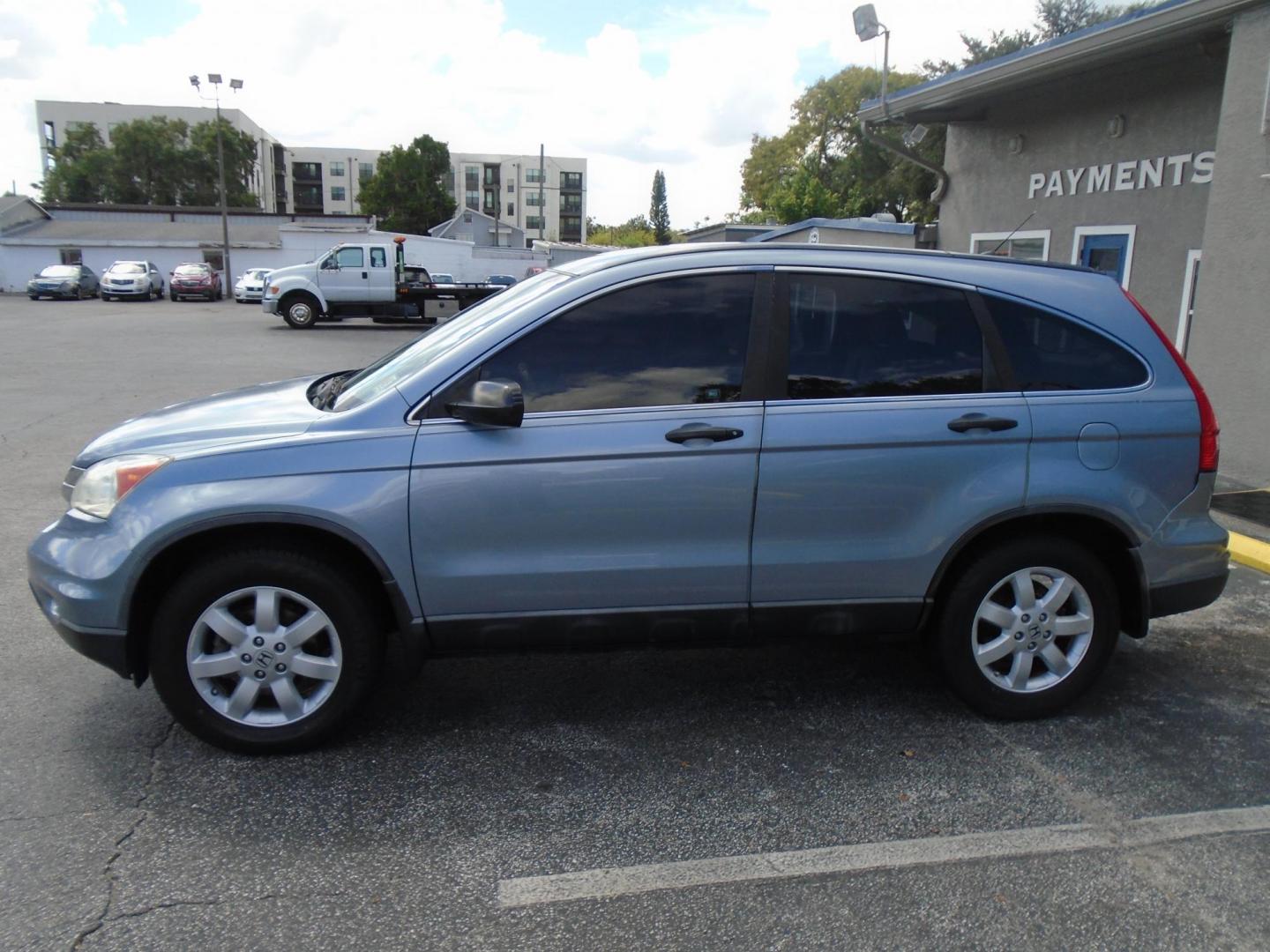 2011 Light Blue /Grey Honda CR-V SE 2WD 5-Speed AT (5J6RE3H48BL) with an 2.4L L4 DOHC 16V engine, 5-Speed Automatic transmission, located at 6112 N Florida Avenue, Tampa, FL, 33604, (888) 521-5131, 27.954929, -82.459534 - Photo#0