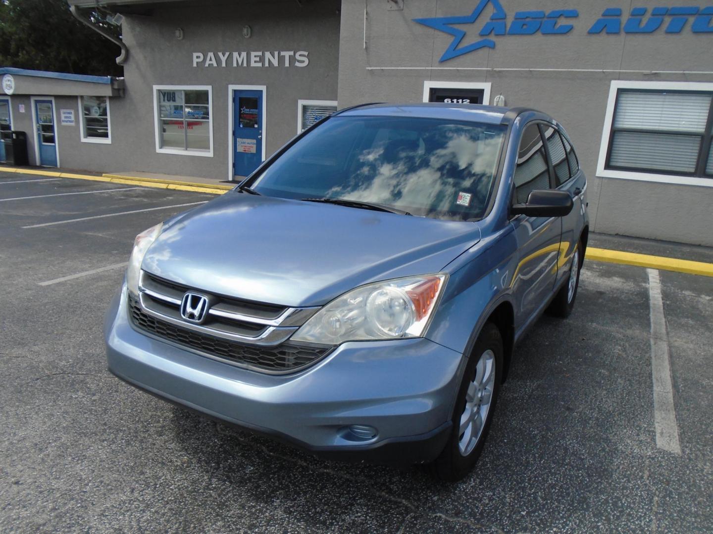 2011 Light Blue /Grey Honda CR-V SE 2WD 5-Speed AT (5J6RE3H48BL) with an 2.4L L4 DOHC 16V engine, 5-Speed Automatic transmission, located at 6112 N Florida Avenue, Tampa, FL, 33604, (888) 521-5131, 27.954929, -82.459534 - Photo#1