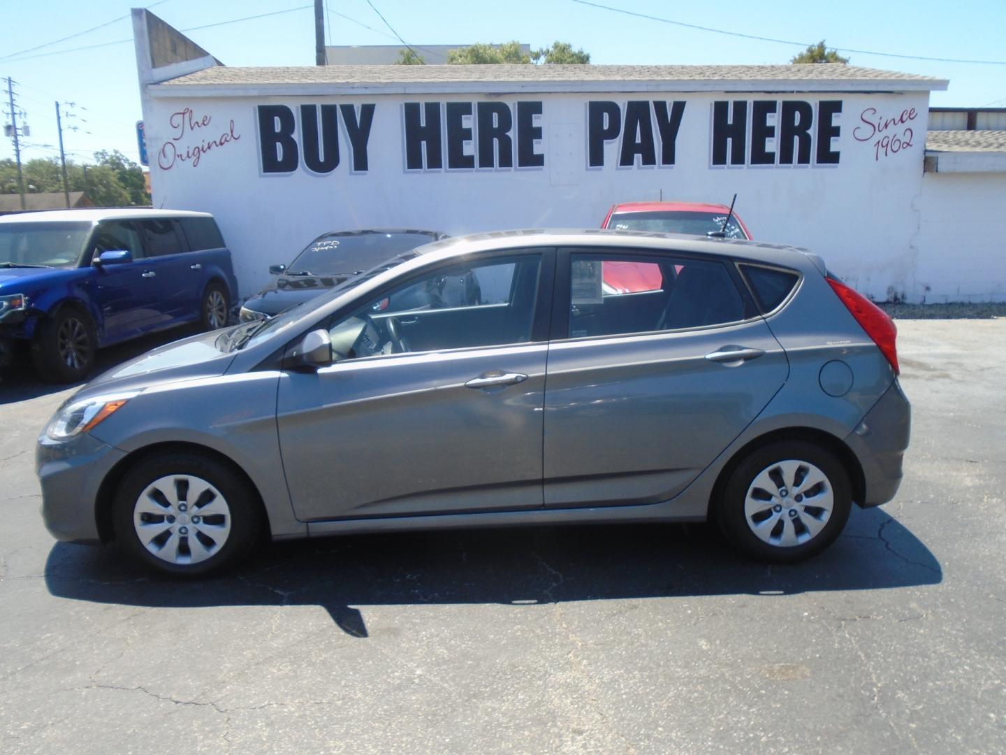 2015 Grey Hyundai Accent GS 5-Door 6A (KMHCT5AE4FU) with an 1.6L L4 DOHC 16V engine, 6-Speed Automatic transmission, located at 6112 N Florida Avenue, Tampa, FL, 33604, (888) 521-5131, 27.954929, -82.459534 - Photo#0