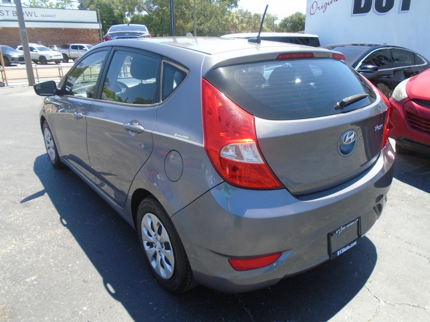 2015 Grey Hyundai Accent GS 5-Door 6A (KMHCT5AE4FU) with an 1.6L L4 DOHC 16V engine, 6-Speed Automatic transmission, located at 6112 N Florida Avenue, Tampa, FL, 33604, (888) 521-5131, 27.954929, -82.459534 - Photo#4