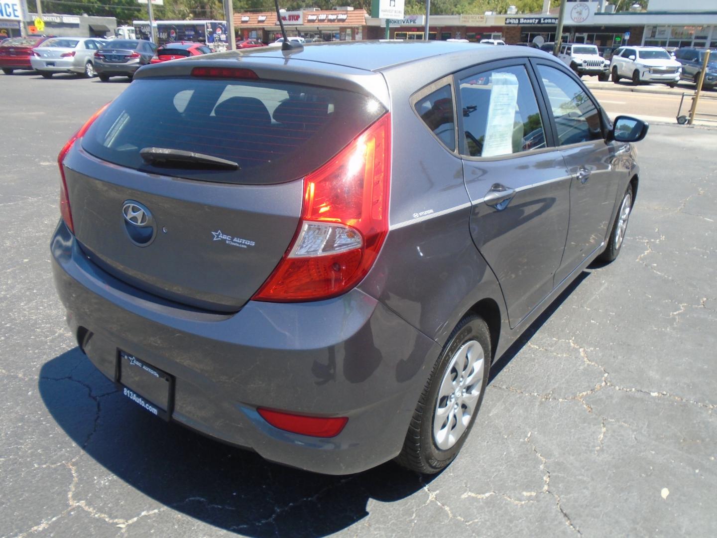 2015 Grey Hyundai Accent GS 5-Door 6A (KMHCT5AE4FU) with an 1.6L L4 DOHC 16V engine, 6-Speed Automatic transmission, located at 6112 N Florida Avenue, Tampa, FL, 33604, (888) 521-5131, 27.954929, -82.459534 - Photo#5