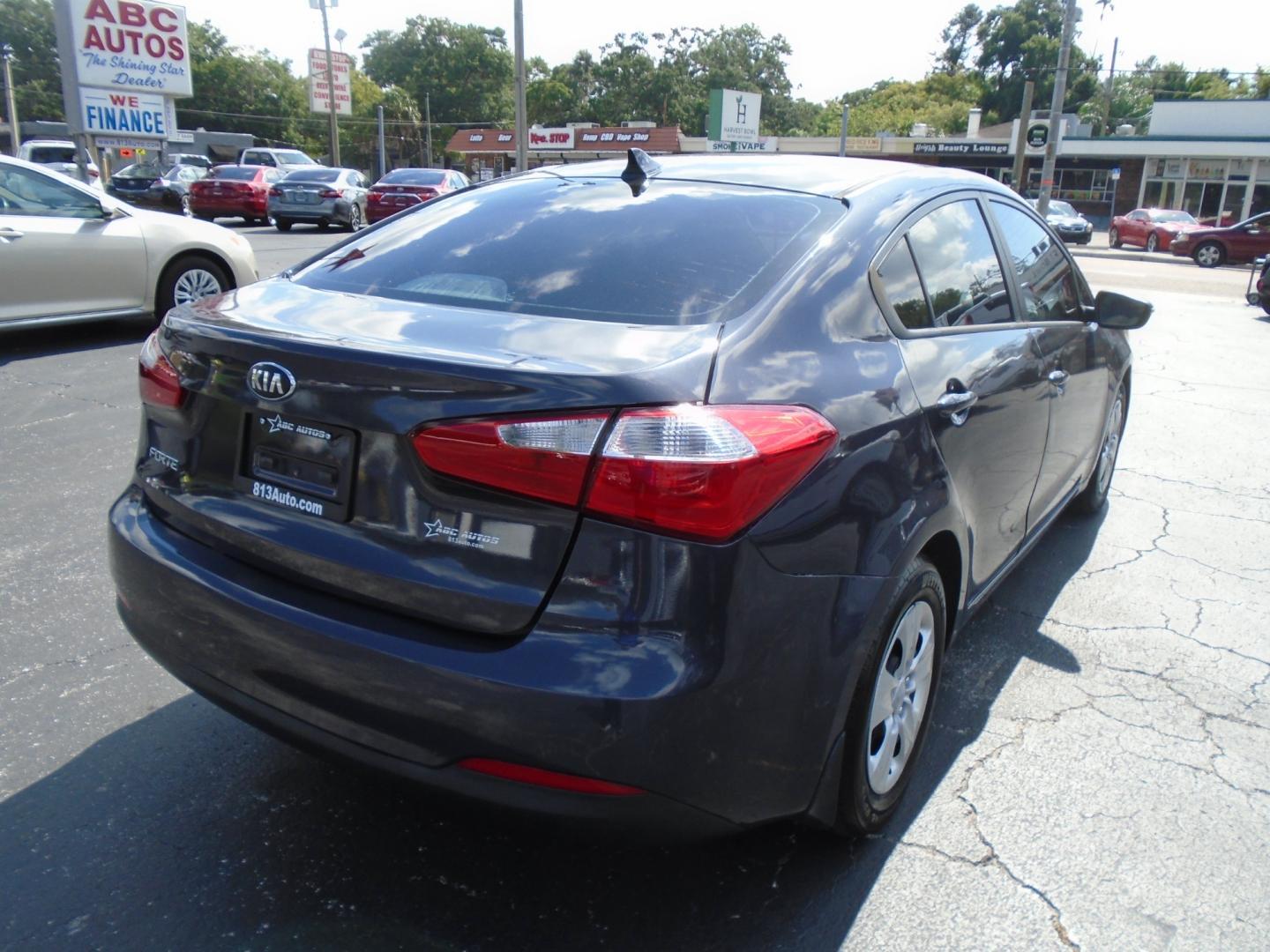 2015 Kia Forte EX (KNAFX4A61F5) with an 1.8L L4 DOHC 16V engine, 6-Speed Automatic transmission, located at 6112 N Florida Avenue, Tampa, FL, 33604, (888) 521-5131, 27.954929, -82.459534 - Photo#7