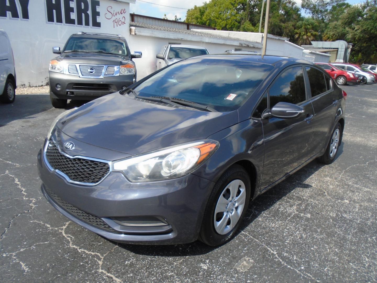 2015 Kia Forte EX (KNAFX4A61F5) with an 1.8L L4 DOHC 16V engine, 6-Speed Automatic transmission, located at 6112 N Florida Avenue, Tampa, FL, 33604, (888) 521-5131, 27.954929, -82.459534 - Photo#4