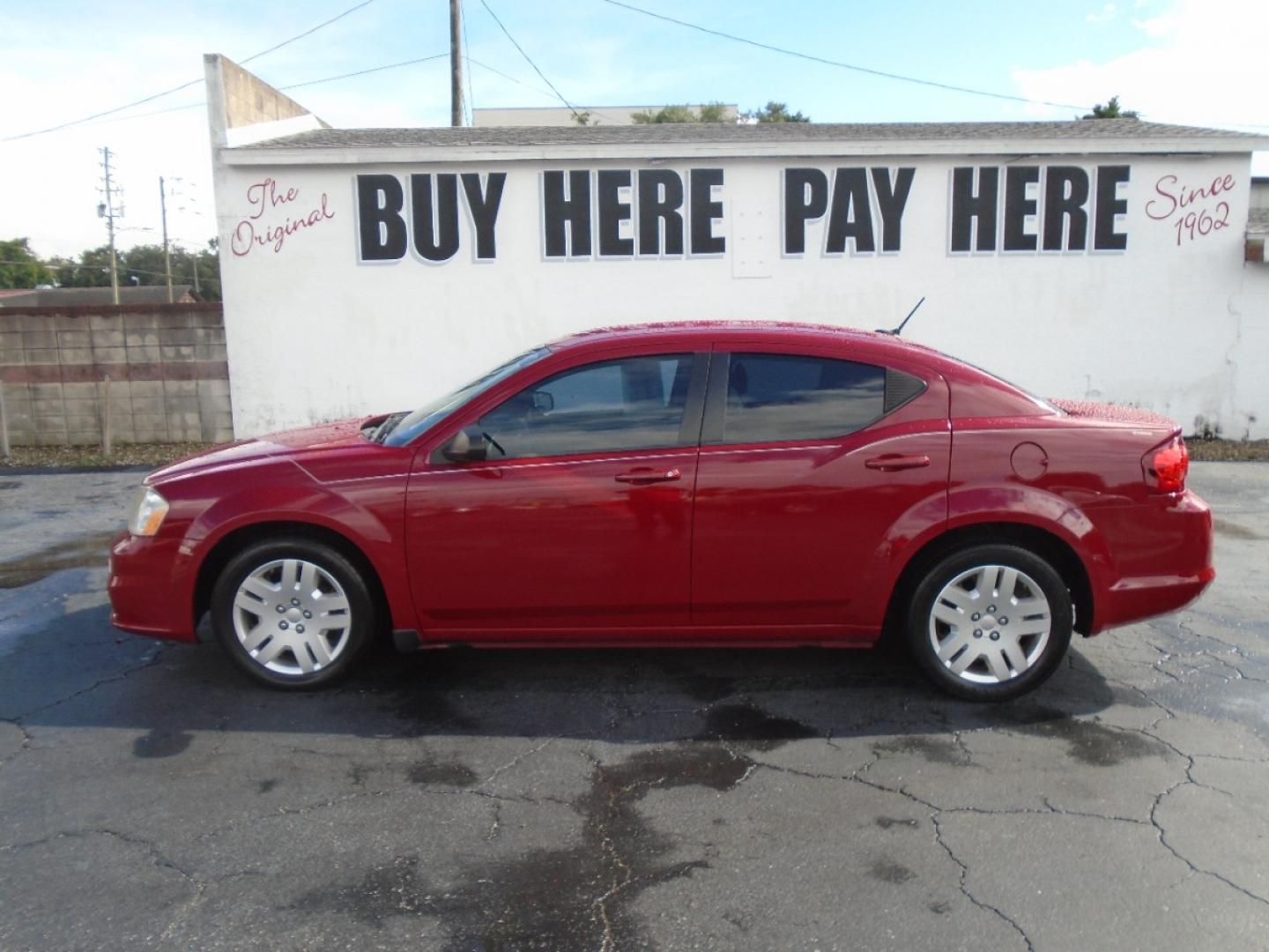 2013 Red /Black Dodge Avenger SE (1C3CDZAG3DN) with an V6, Flex Fuel, 3.6 Liter engine, Automatic, 6-Spd w/AutoStick transmission, located at 6112 N Florida Avenue, Tampa, FL, 33604, (888) 521-5131, 27.954929, -82.459534 - Photo#0