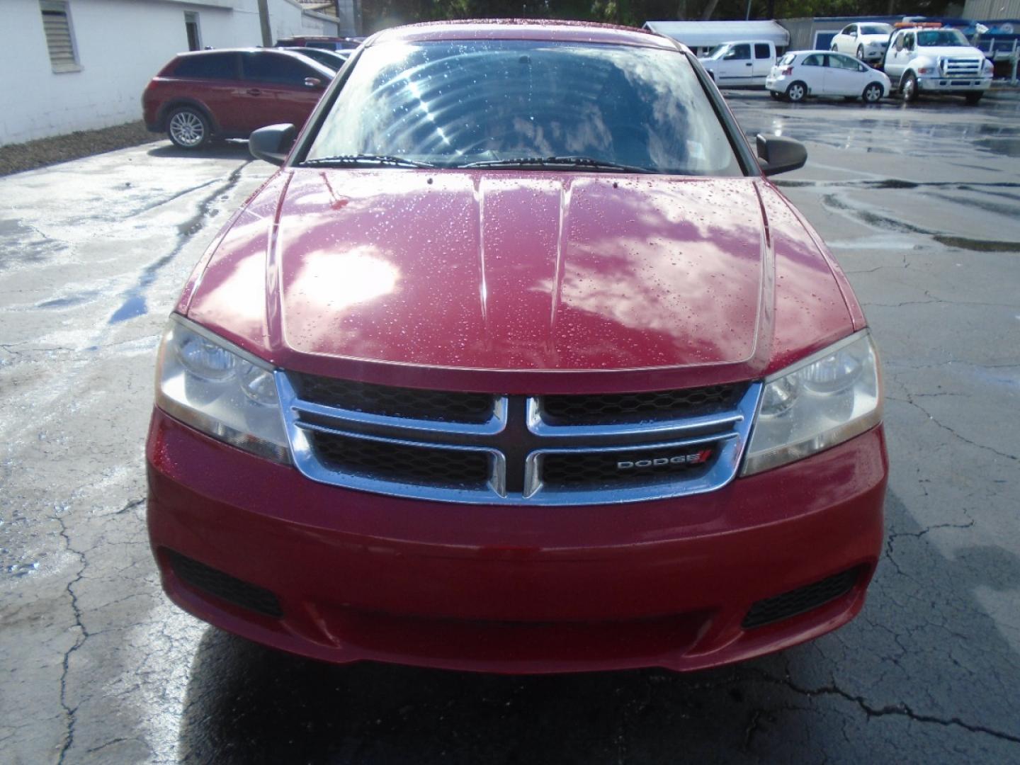 2013 Red /Black Dodge Avenger SE (1C3CDZAG3DN) with an V6, Flex Fuel, 3.6 Liter engine, Automatic, 6-Spd w/AutoStick transmission, located at 6112 N Florida Avenue, Tampa, FL, 33604, (888) 521-5131, 27.954929, -82.459534 - Photo#1