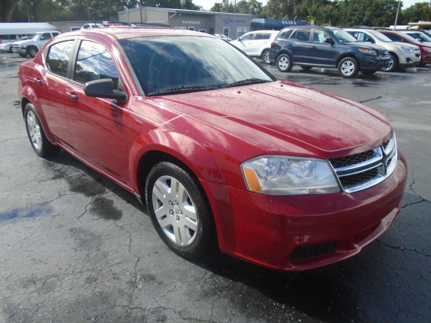 2013 Red /Black Dodge Avenger SE (1C3CDZAG3DN) with an V6, Flex Fuel, 3.6 Liter engine, Automatic, 6-Spd w/AutoStick transmission, located at 6112 N Florida Avenue, Tampa, FL, 33604, (888) 521-5131, 27.954929, -82.459534 - Photo#2