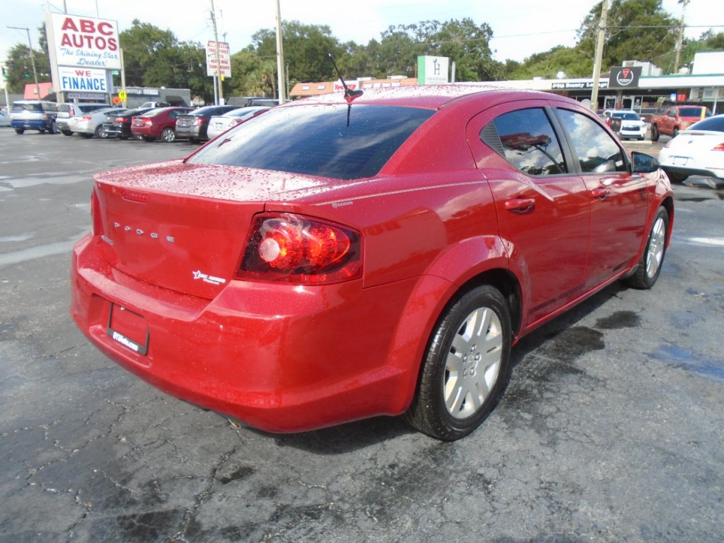 2013 Red /Black Dodge Avenger SE (1C3CDZAG3DN) with an V6, Flex Fuel, 3.6 Liter engine, Automatic, 6-Spd w/AutoStick transmission, located at 6112 N Florida Avenue, Tampa, FL, 33604, (888) 521-5131, 27.954929, -82.459534 - Photo#5