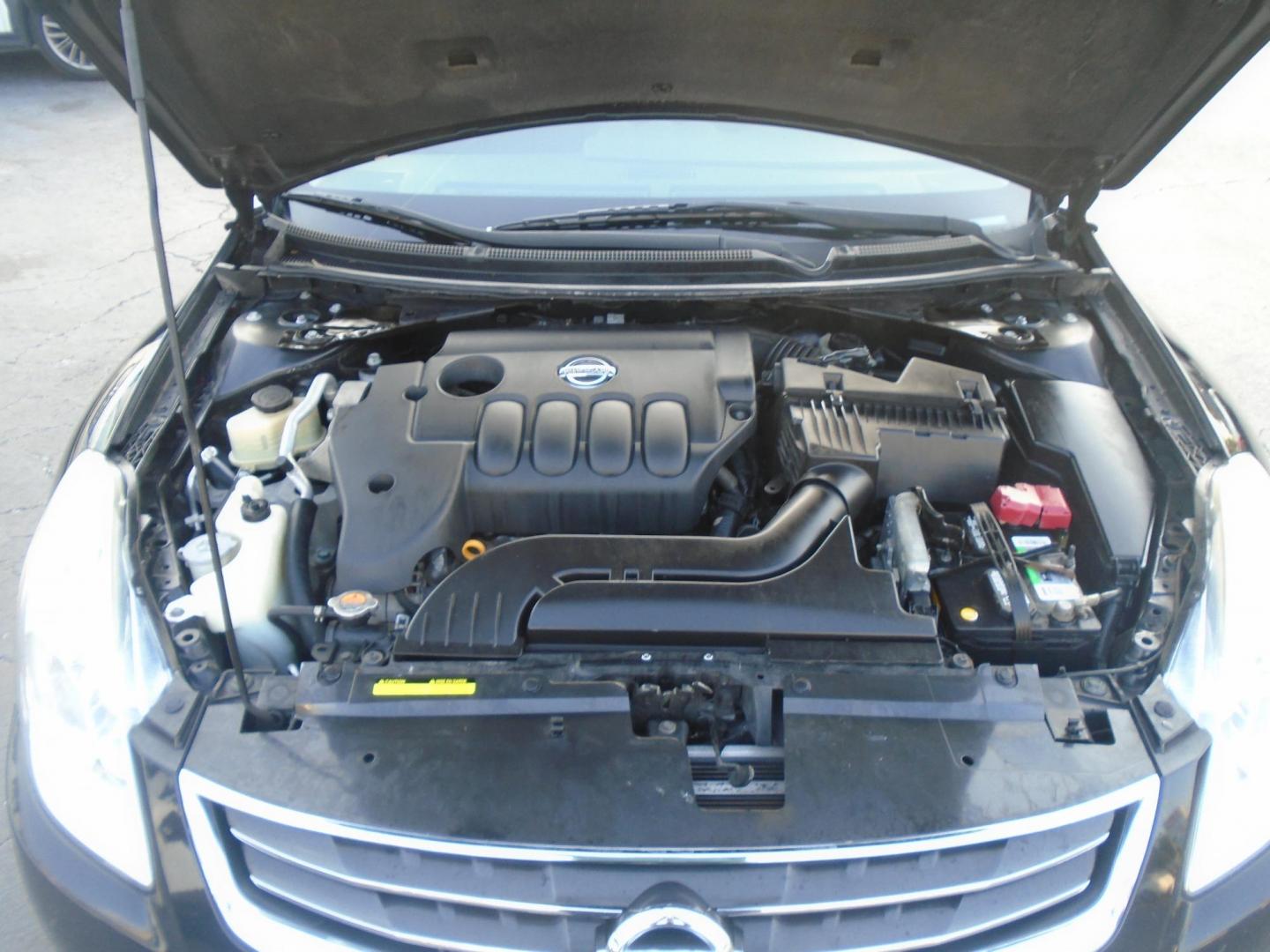 2010 Nissan Altima 2.5 (1N4AL2AP7AC) with an 2.5L L4 DOHC 16V engine, 6-Speed Manual transmission, located at 6112 N Florida Avenue, Tampa, FL, 33604, (888) 521-5131, 27.954929, -82.459534 - Photo#10