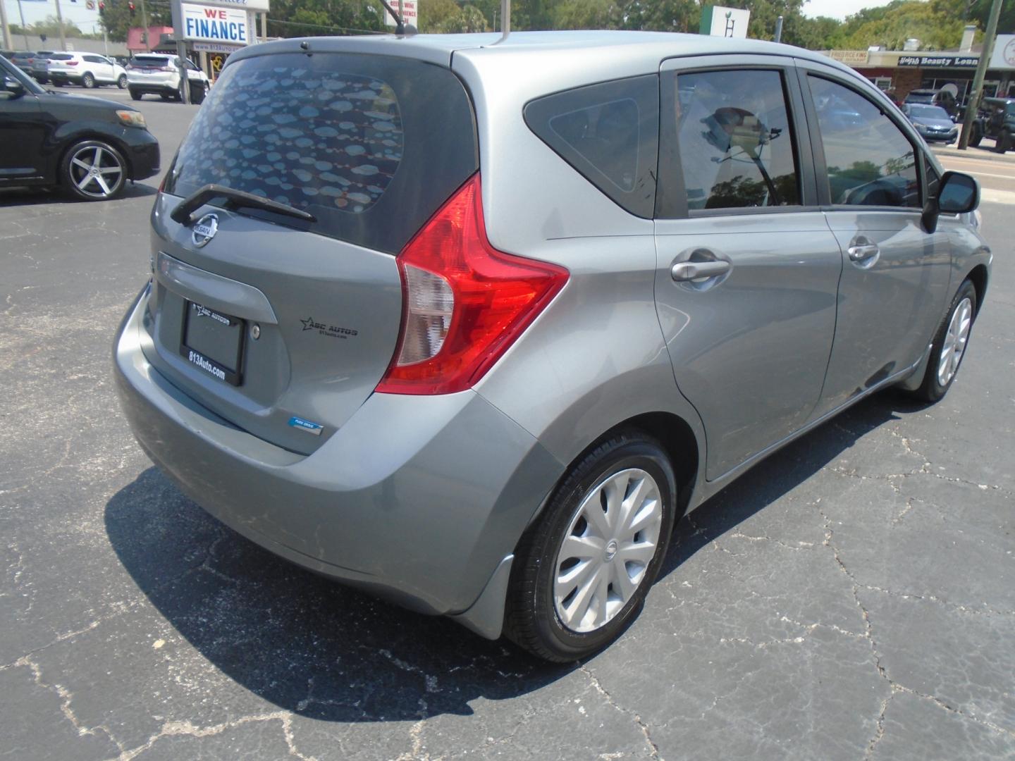 2014 Silver Nissan Versa Note S (3N1CE2CP8EL) with an 1.6L L4 DOHC 16V engine, 5-Speed Manual transmission, located at 6112 N Florida Avenue, Tampa, FL, 33604, (888) 521-5131, 27.954929, -82.459534 - Photo#5