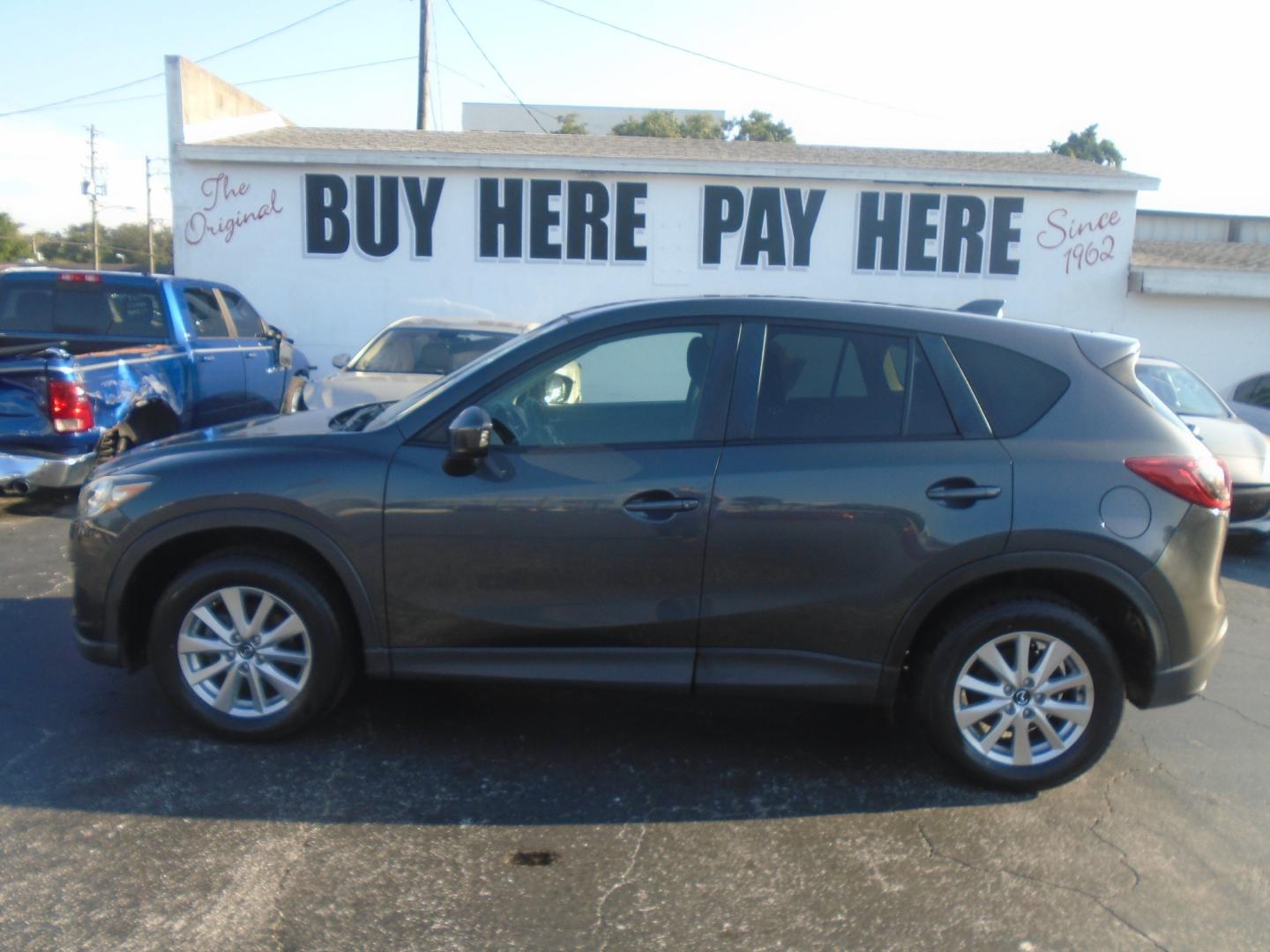 2014 Grey Mazda CX-5 Touring (JM3KE2CY3E0) with an 2.5L L4 DOHC 16V engine, 6-Speed Automatic transmission, located at 6112 N Florida Avenue, Tampa, FL, 33604, (888) 521-5131, 27.954929, -82.459534 - Photo#0