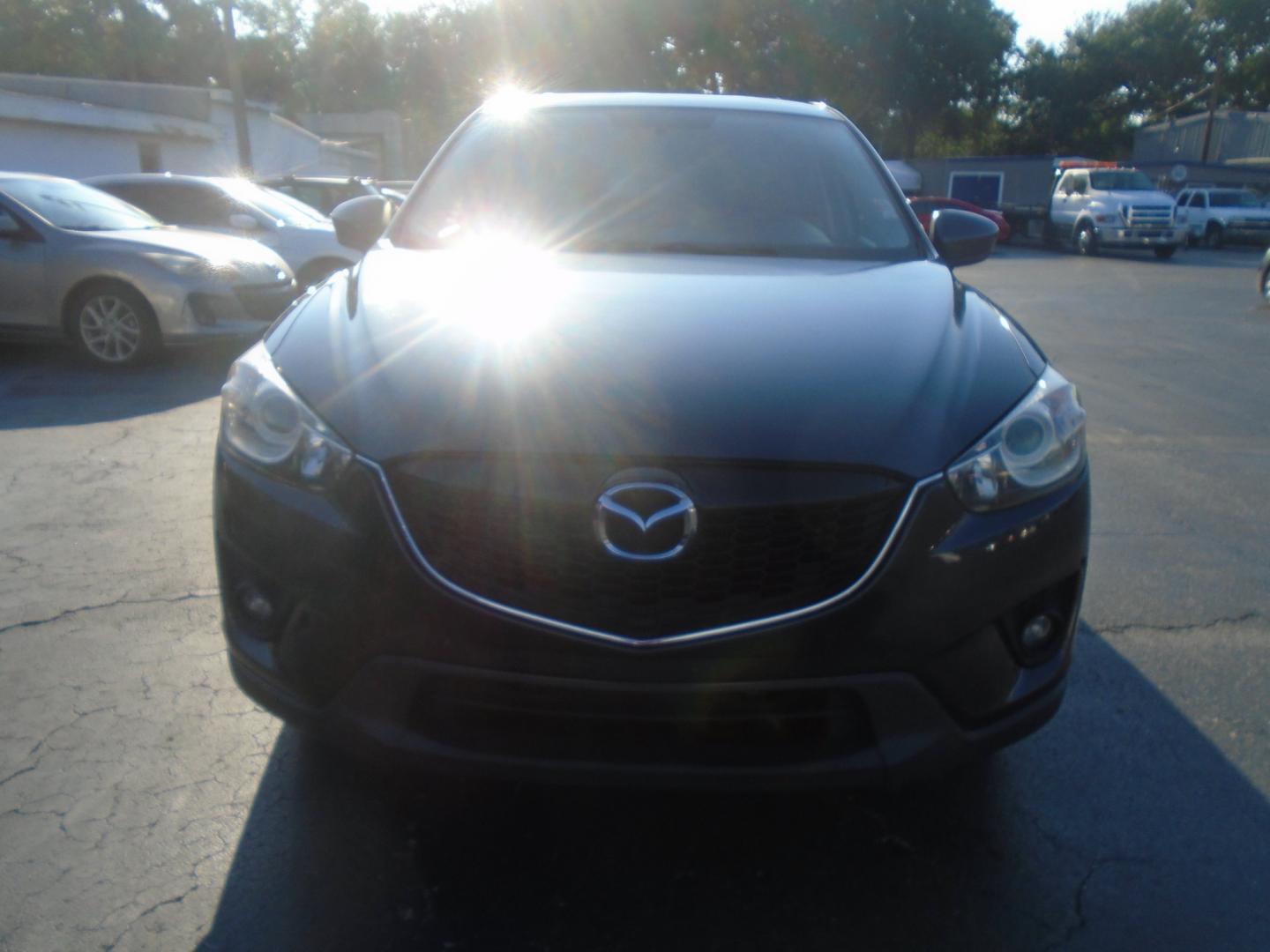 2014 Grey Mazda CX-5 Touring (JM3KE2CY3E0) with an 2.5L L4 DOHC 16V engine, 6-Speed Automatic transmission, located at 6112 N Florida Avenue, Tampa, FL, 33604, (888) 521-5131, 27.954929, -82.459534 - Photo#1