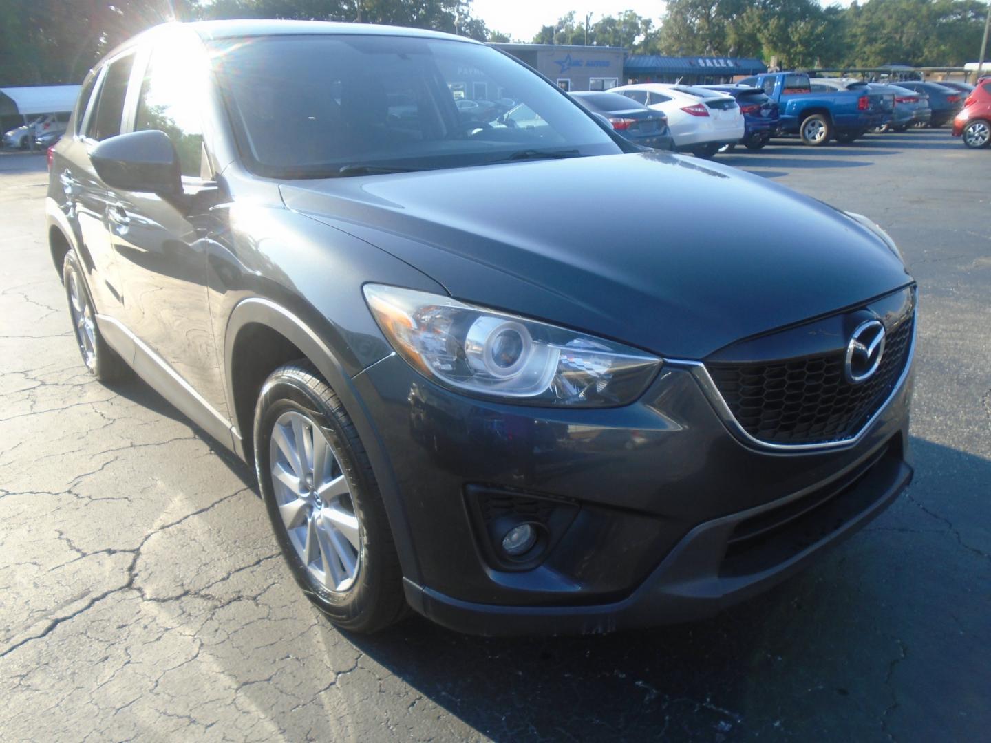 2014 Grey Mazda CX-5 Touring (JM3KE2CY3E0) with an 2.5L L4 DOHC 16V engine, 6-Speed Automatic transmission, located at 6112 N Florida Avenue, Tampa, FL, 33604, (888) 521-5131, 27.954929, -82.459534 - Photo#2