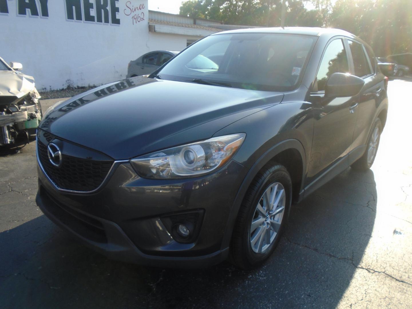 2014 Grey Mazda CX-5 Touring (JM3KE2CY3E0) with an 2.5L L4 DOHC 16V engine, 6-Speed Automatic transmission, located at 6112 N Florida Avenue, Tampa, FL, 33604, (888) 521-5131, 27.954929, -82.459534 - Photo#3