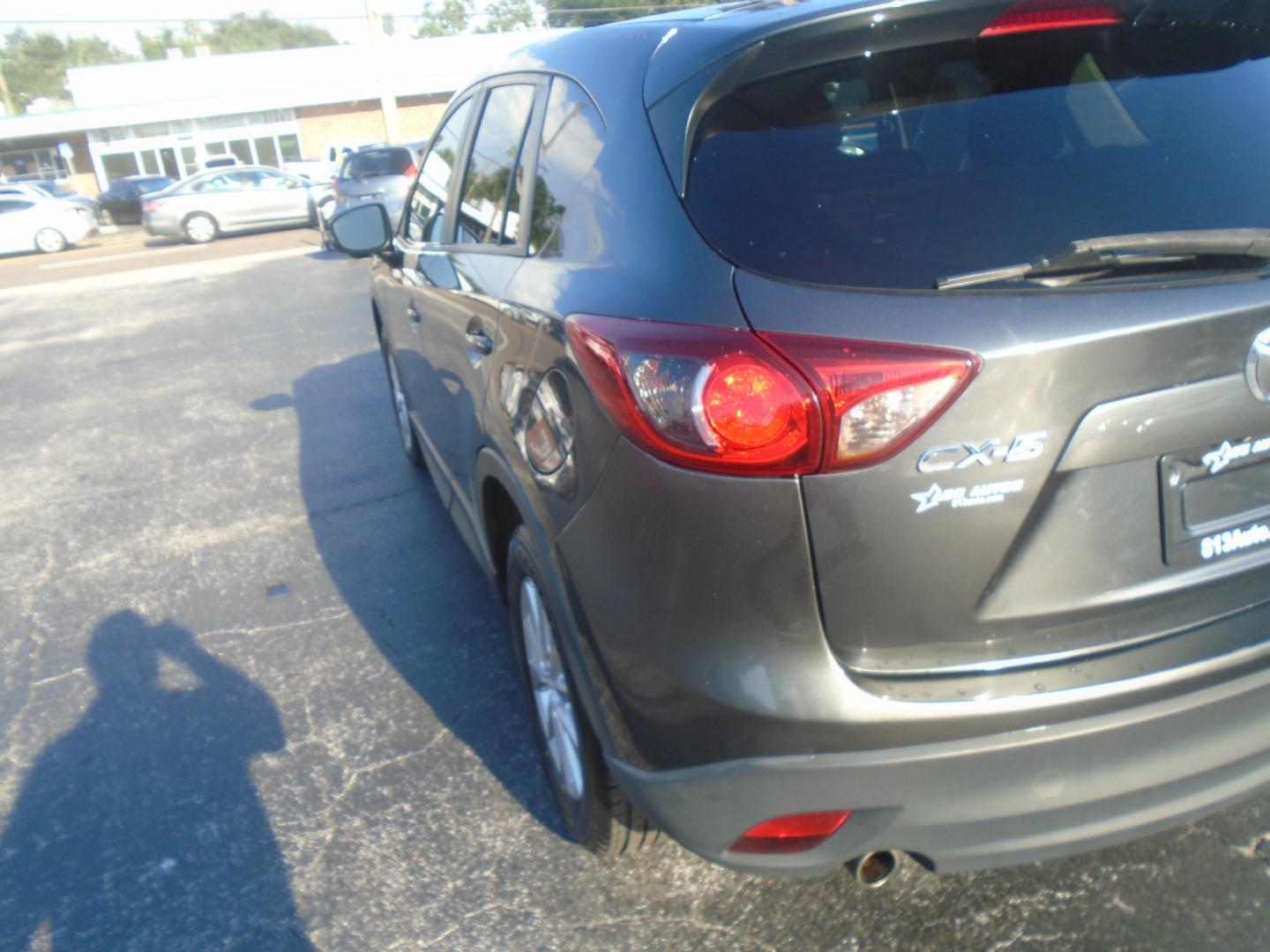 2014 Grey Mazda CX-5 Touring (JM3KE2CY3E0) with an 2.5L L4 DOHC 16V engine, 6-Speed Automatic transmission, located at 6112 N Florida Avenue, Tampa, FL, 33604, (888) 521-5131, 27.954929, -82.459534 - Photo#4