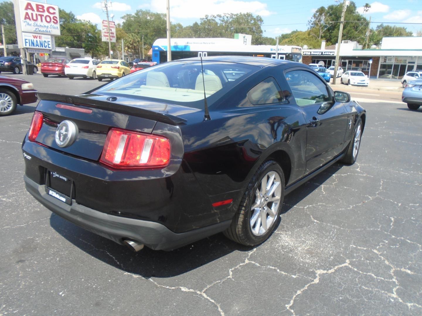 2011 Black /Tan Ford Mustang V6 Coupe (1ZVBP8AM0B5) with an 3.7L V6 DOHC 24V engine, located at 6112 N Florida Avenue, Tampa, FL, 33604, (888) 521-5131, 27.954929, -82.459534 - Photo#5