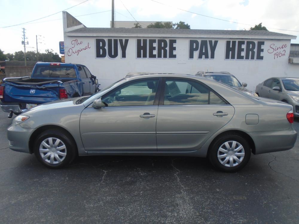 2005 Ivory /Grey Toyota Camry LE (4T1BE30K35U) with an 2.4L L4 DOHC 16V engine, located at 6112 N Florida Avenue, Tampa, FL, 33604, (888) 521-5131, 27.954929, -82.459534 - Photo #0