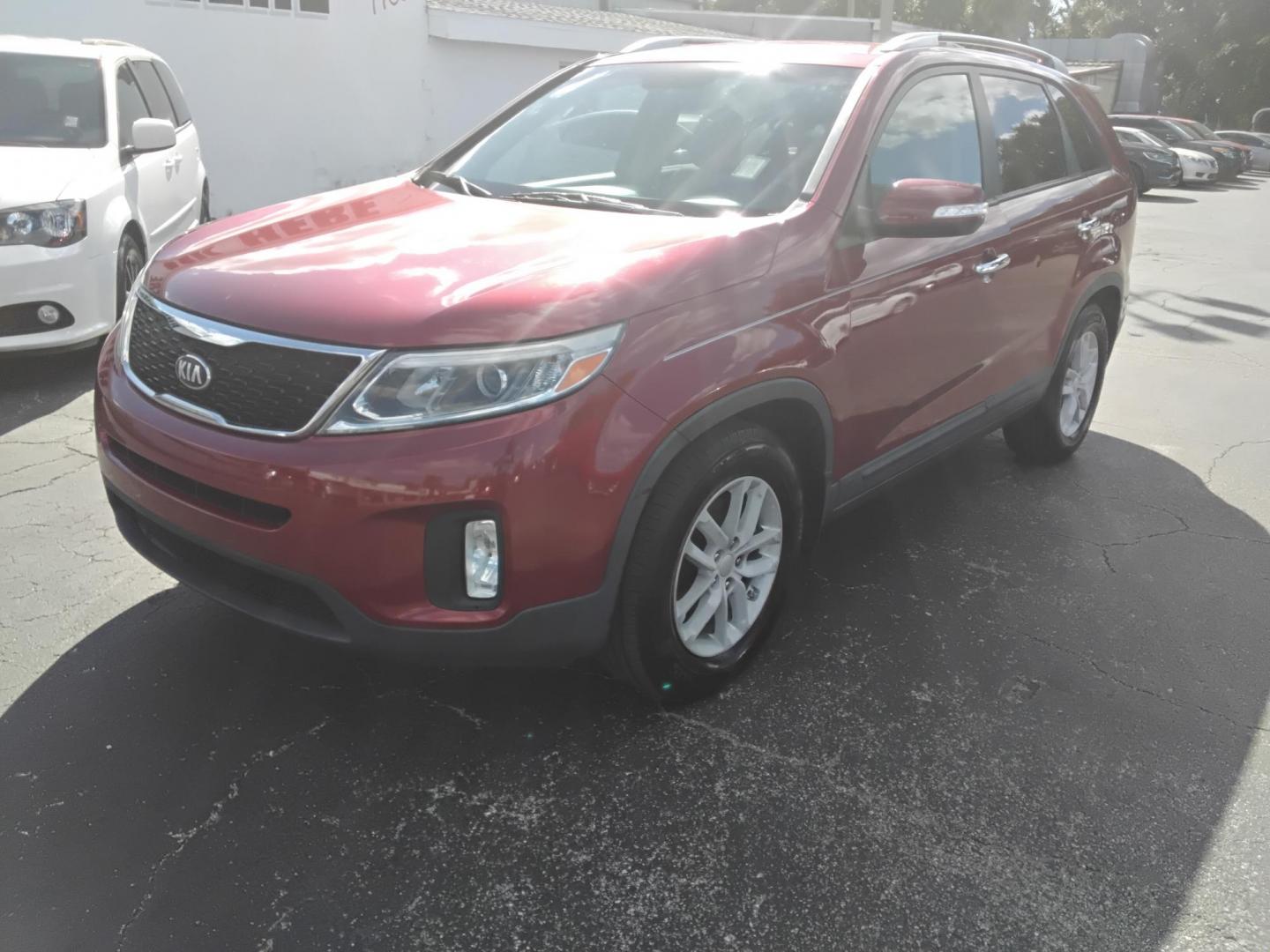 2014 Red /Tan Kia Sorento LX V6 FWD (5XYKT4A74EG) with an 4-Cyl, GDI, 2.4 Liter engine, Automatic, 6-Spd w/Overdrive and Sportmatic transmission, located at 6112 N Florida Avenue, Tampa, FL, 33604, (888) 521-5131, 27.954929, -82.459534 - 499$ down plus tax & tag. - Photo#2