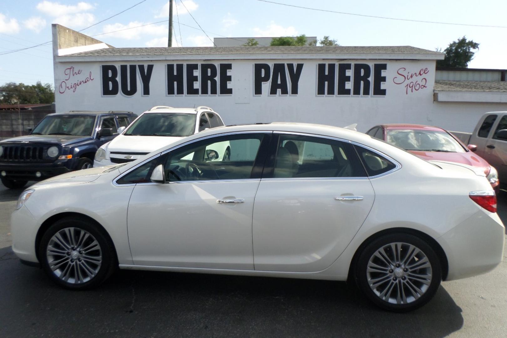 2012 White /Tan Buick Verano Leather (1G4PS5SK5C4) with an 2.4L L4 DOHC 16V FFV engine, 6-Speed Automatic transmission, located at 6112 N Florida Avenue, Tampa, FL, 33604, (888) 521-5131, 27.954929, -82.459534 - Photo#0