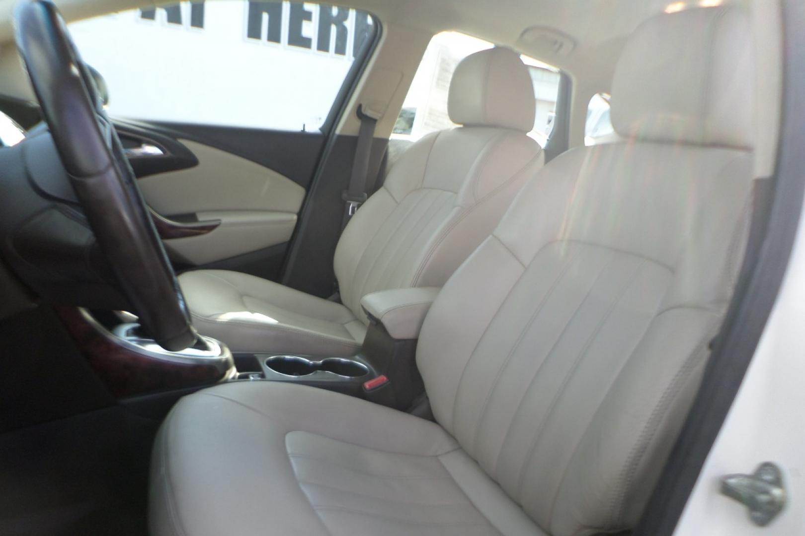 2012 White /Tan Buick Verano Leather (1G4PS5SK5C4) with an 2.4L L4 DOHC 16V FFV engine, 6-Speed Automatic transmission, located at 6112 N Florida Avenue, Tampa, FL, 33604, (888) 521-5131, 27.954929, -82.459534 - Photo#9