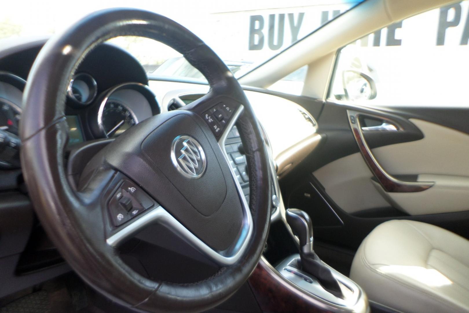 2012 White /Tan Buick Verano Leather (1G4PS5SK5C4) with an 2.4L L4 DOHC 16V FFV engine, 6-Speed Automatic transmission, located at 6112 N Florida Avenue, Tampa, FL, 33604, (888) 521-5131, 27.954929, -82.459534 - Photo#11