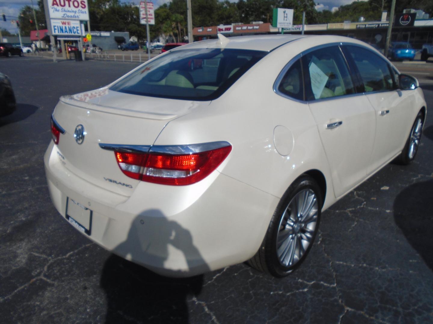 2012 White /Tan Buick Verano Leather (1G4PS5SK5C4) with an 2.4L L4 DOHC 16V FFV engine, 6-Speed Automatic transmission, located at 6112 N Florida Avenue, Tampa, FL, 33604, (888) 521-5131, 27.954929, -82.459534 - Photo#17