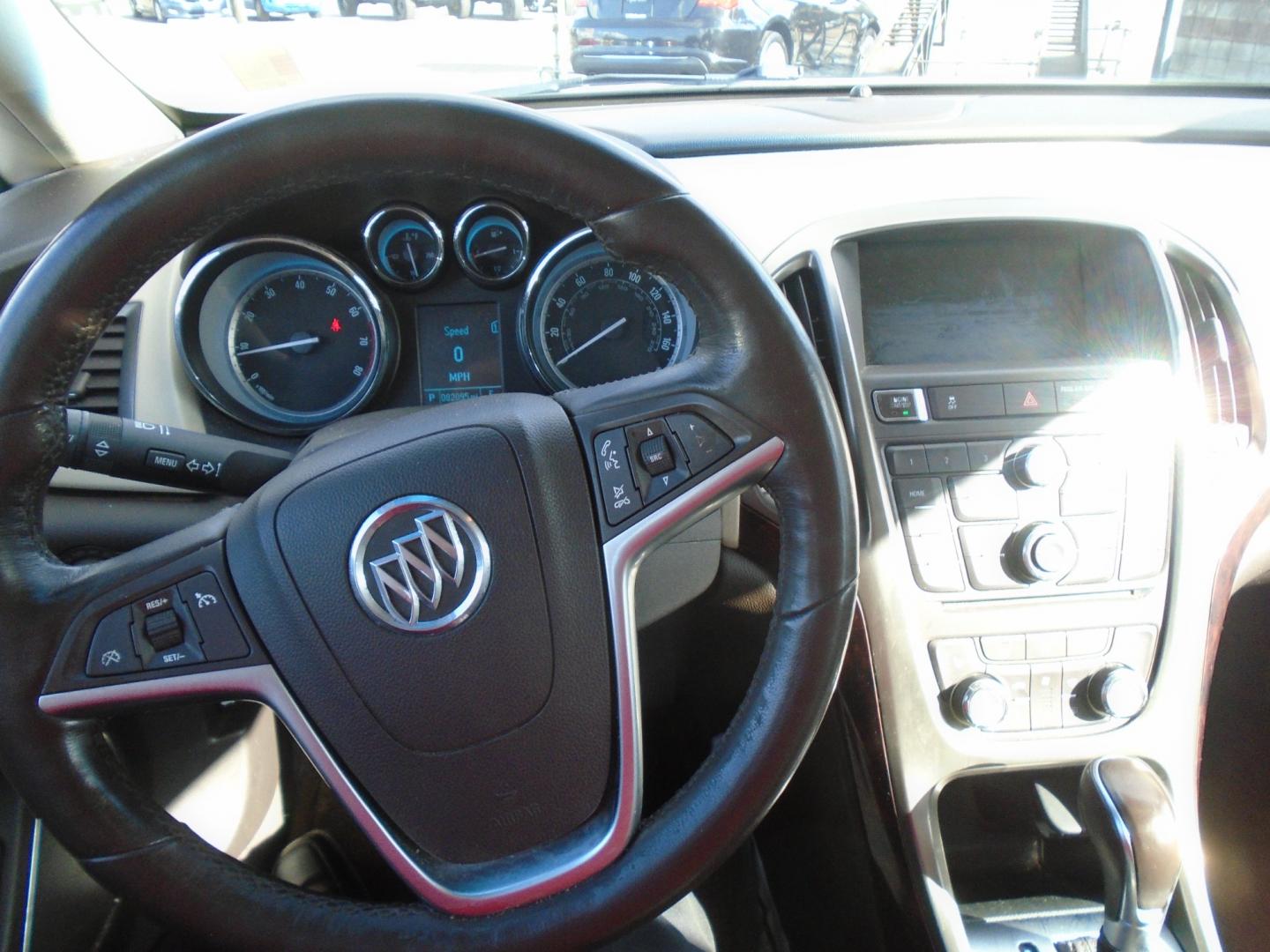 2012 White /Tan Buick Verano Leather (1G4PS5SK5C4) with an 2.4L L4 DOHC 16V FFV engine, 6-Speed Automatic transmission, located at 6112 N Florida Avenue, Tampa, FL, 33604, (888) 521-5131, 27.954929, -82.459534 - Photo#23