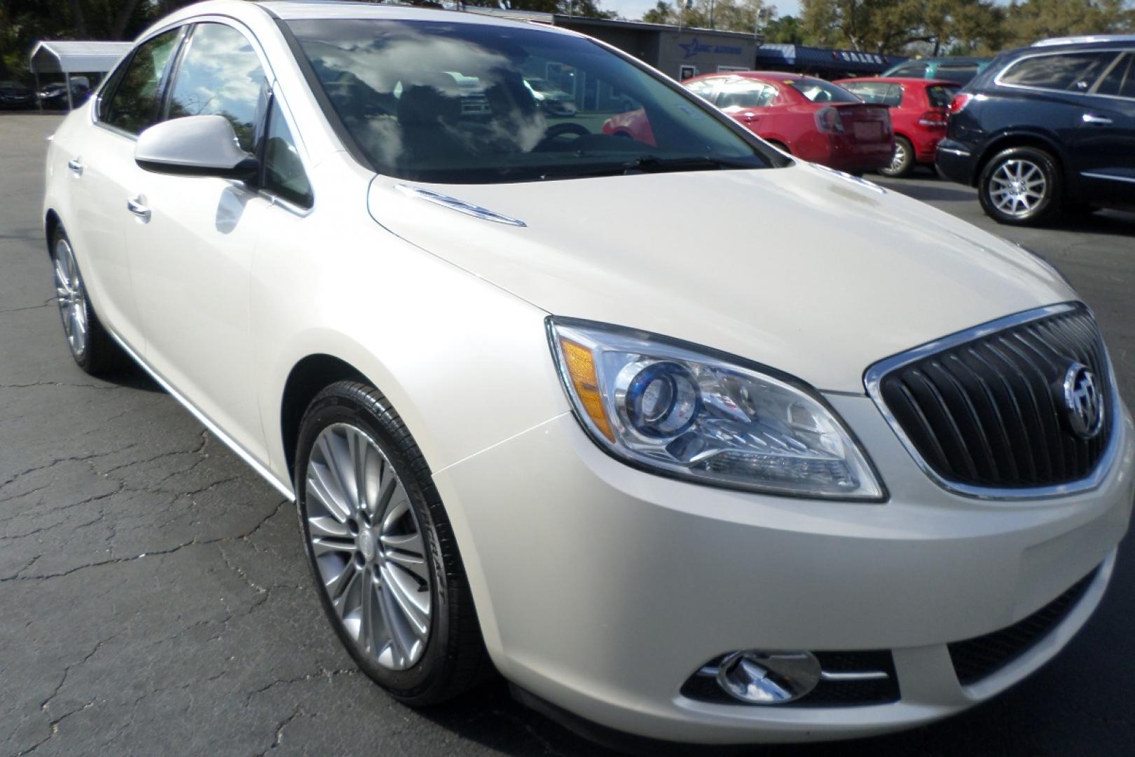 2012 White /Tan Buick Verano Leather (1G4PS5SK5C4) with an 2.4L L4 DOHC 16V FFV engine, 6-Speed Automatic transmission, located at 6112 N Florida Avenue, Tampa, FL, 33604, (888) 521-5131, 27.954929, -82.459534 - Photo#2